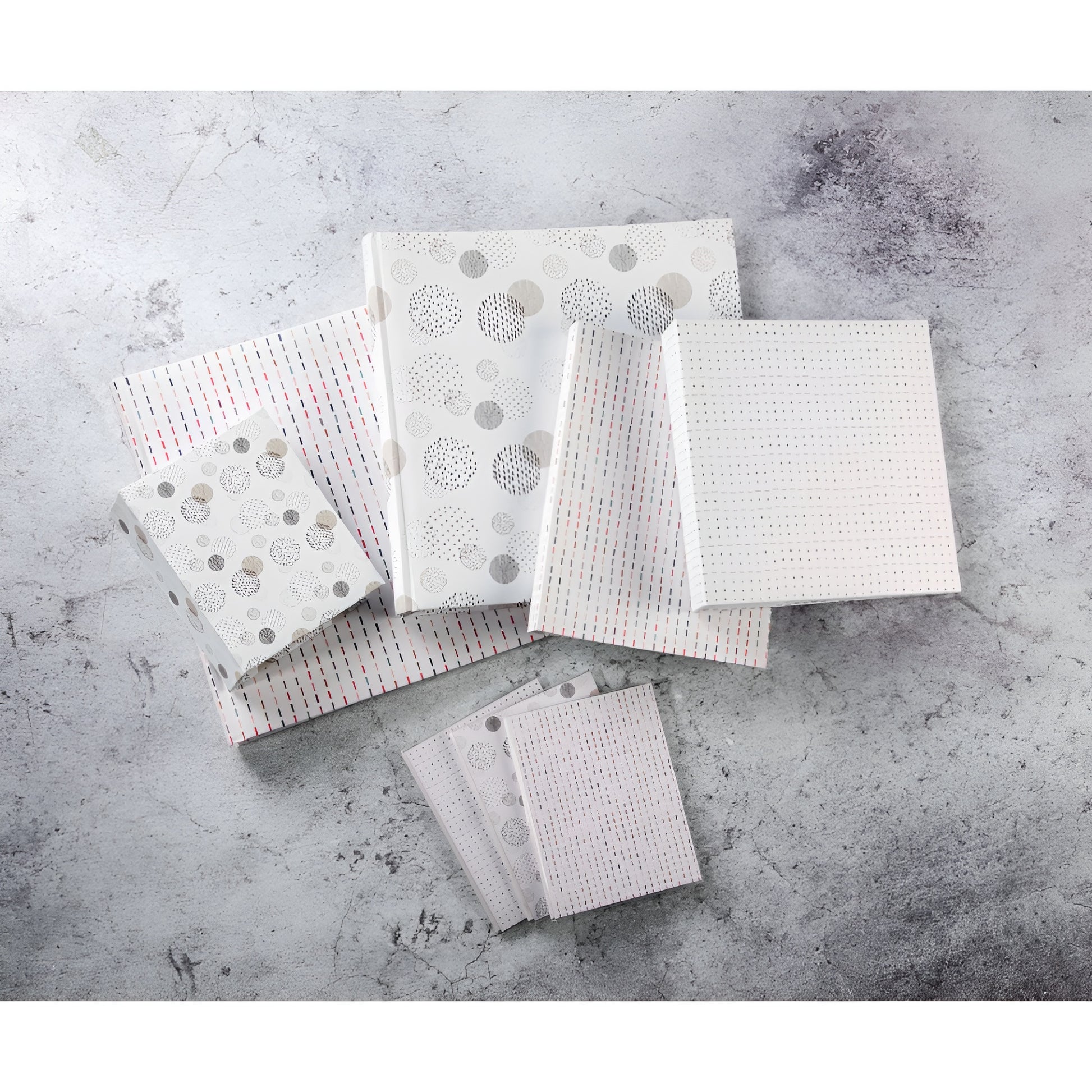 A Hama photo album with colorful graphic squares and lines pattern.