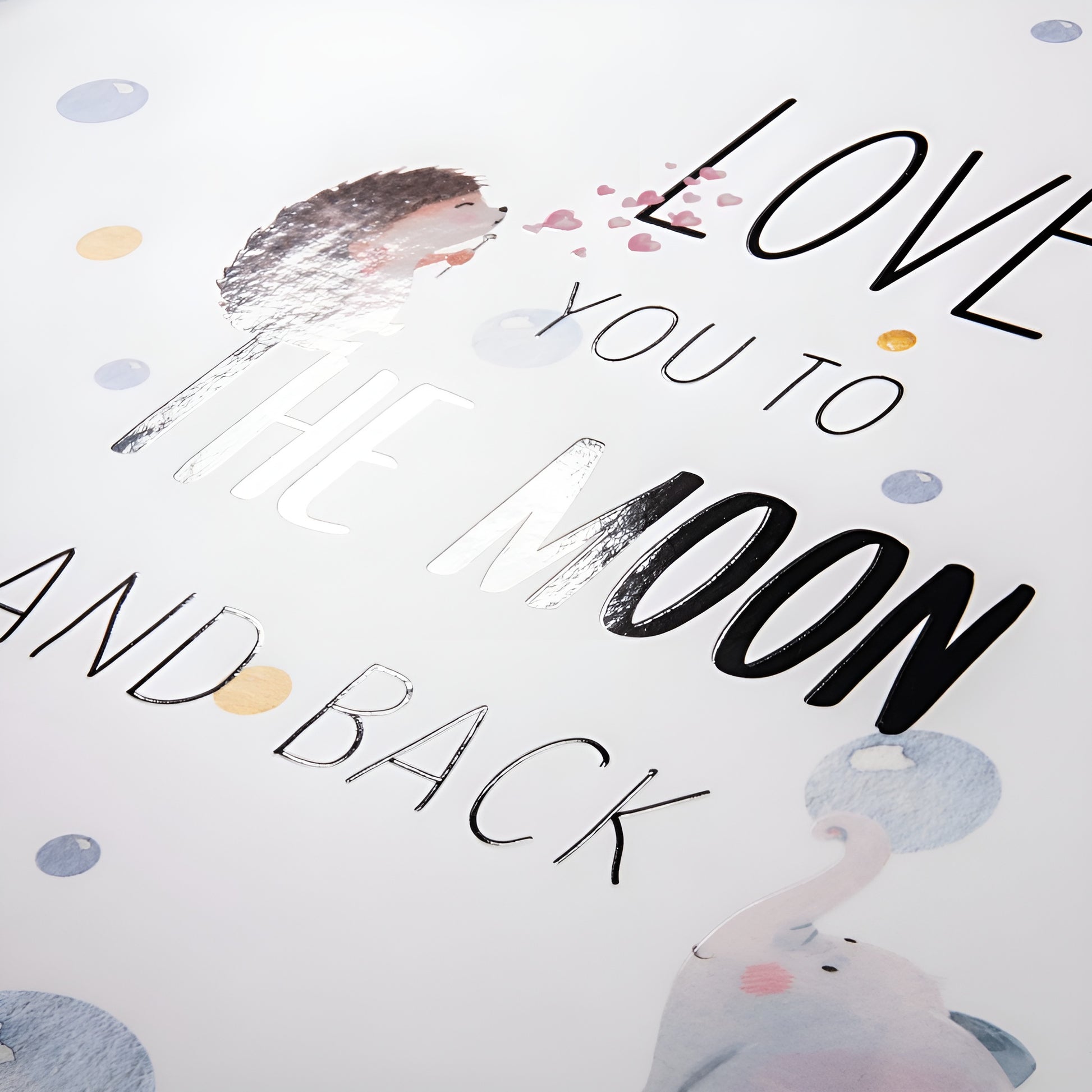 Hama photo album cover featuring the phrase "love you to the moon and back" with decorative elements.