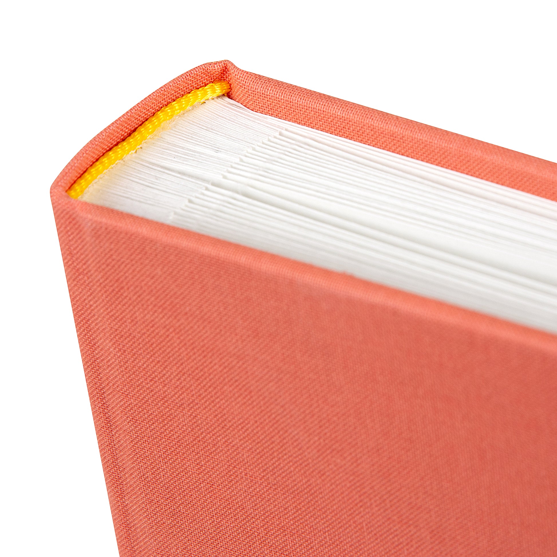An elegant salmon colored photo album, perfect for your memories
