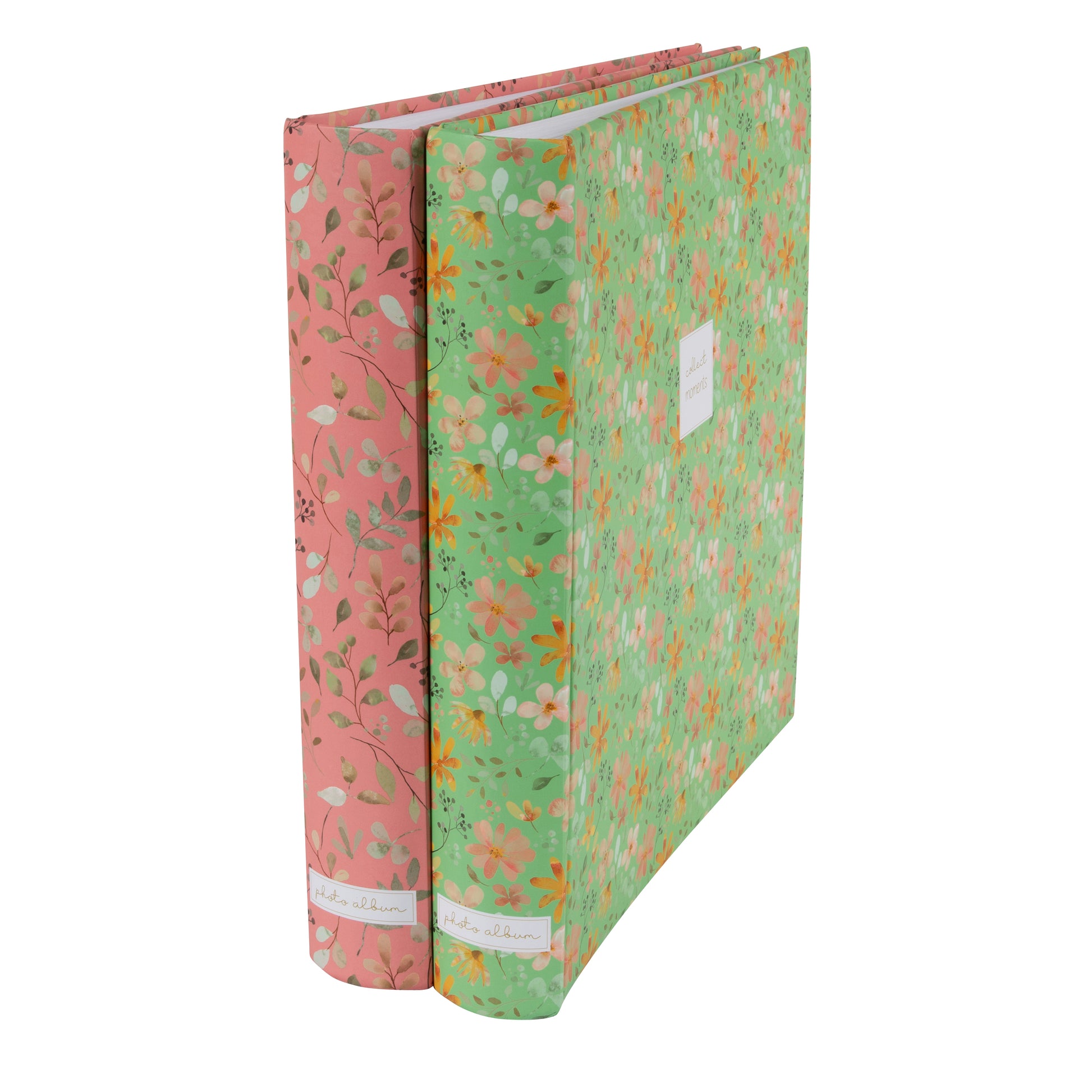 Goldbuch floral photo albums in pink and green, featuring a white label, arranged on a surface, resembling a photo album.