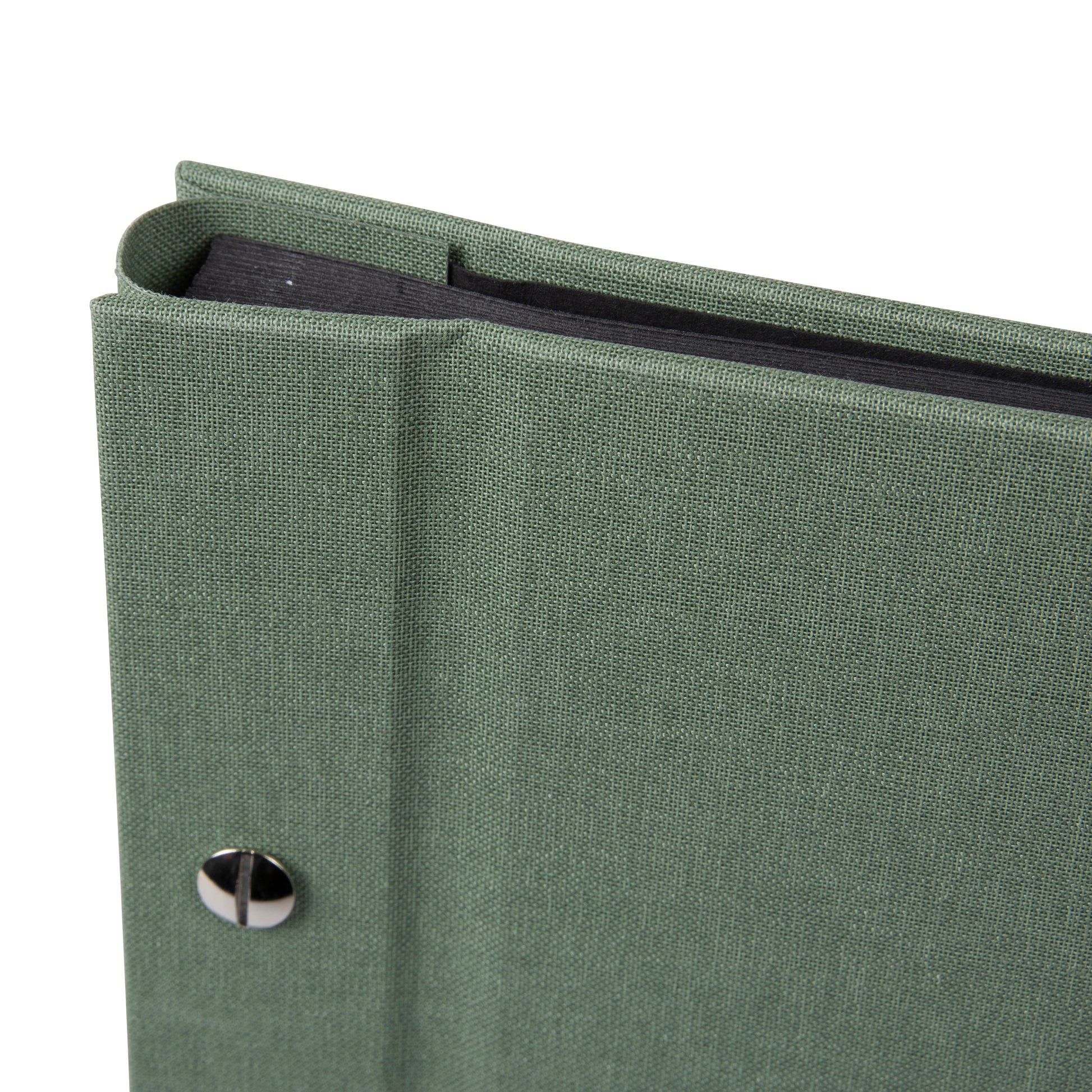 A Goldbuch green photo album with a window displaying a vintage van on a white background