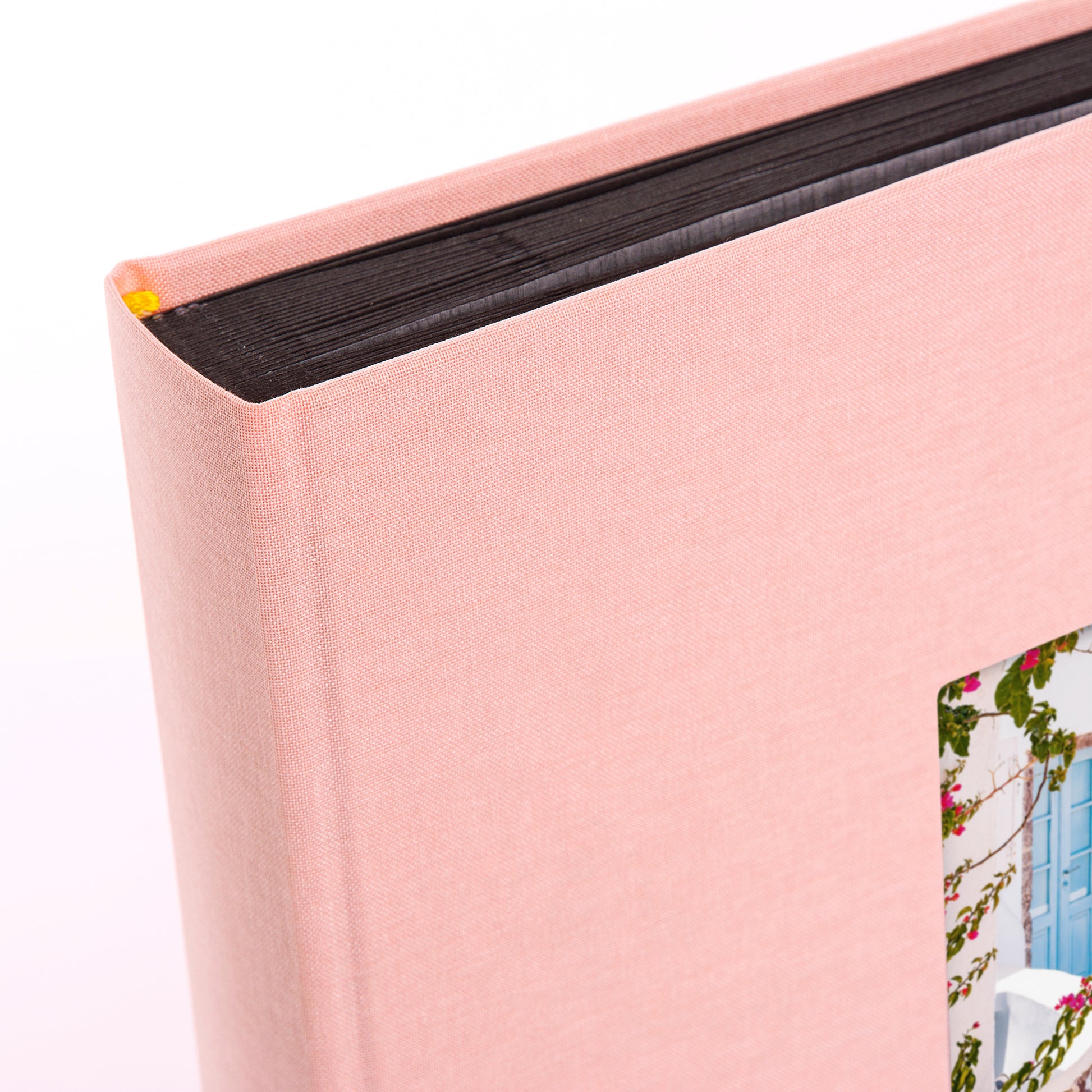 Rose Goldbuch photo album with a small rectangular window displaying a scenic image.