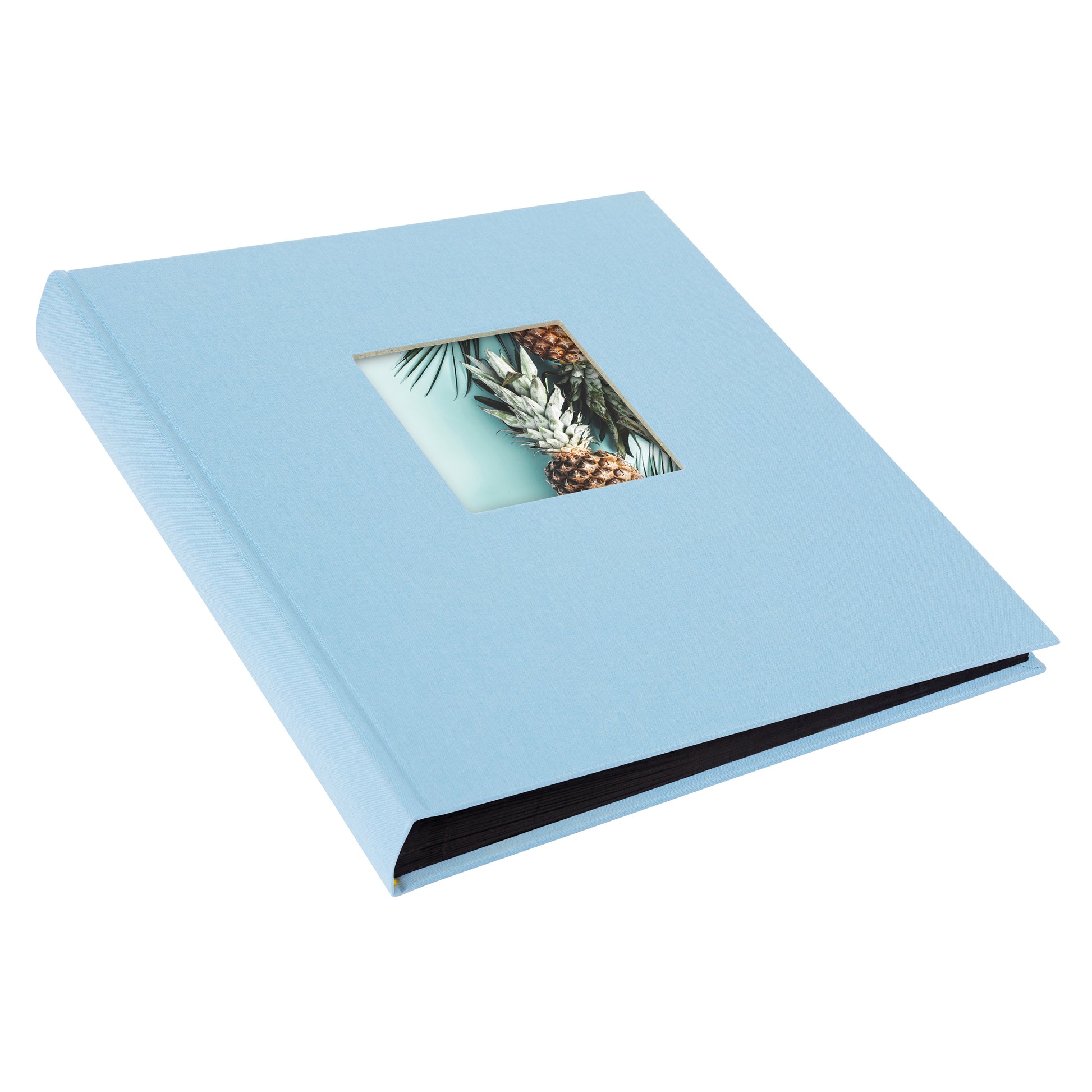 An elegant sky blue Goldbuch photo album with black pages, with a pineapple on its cover