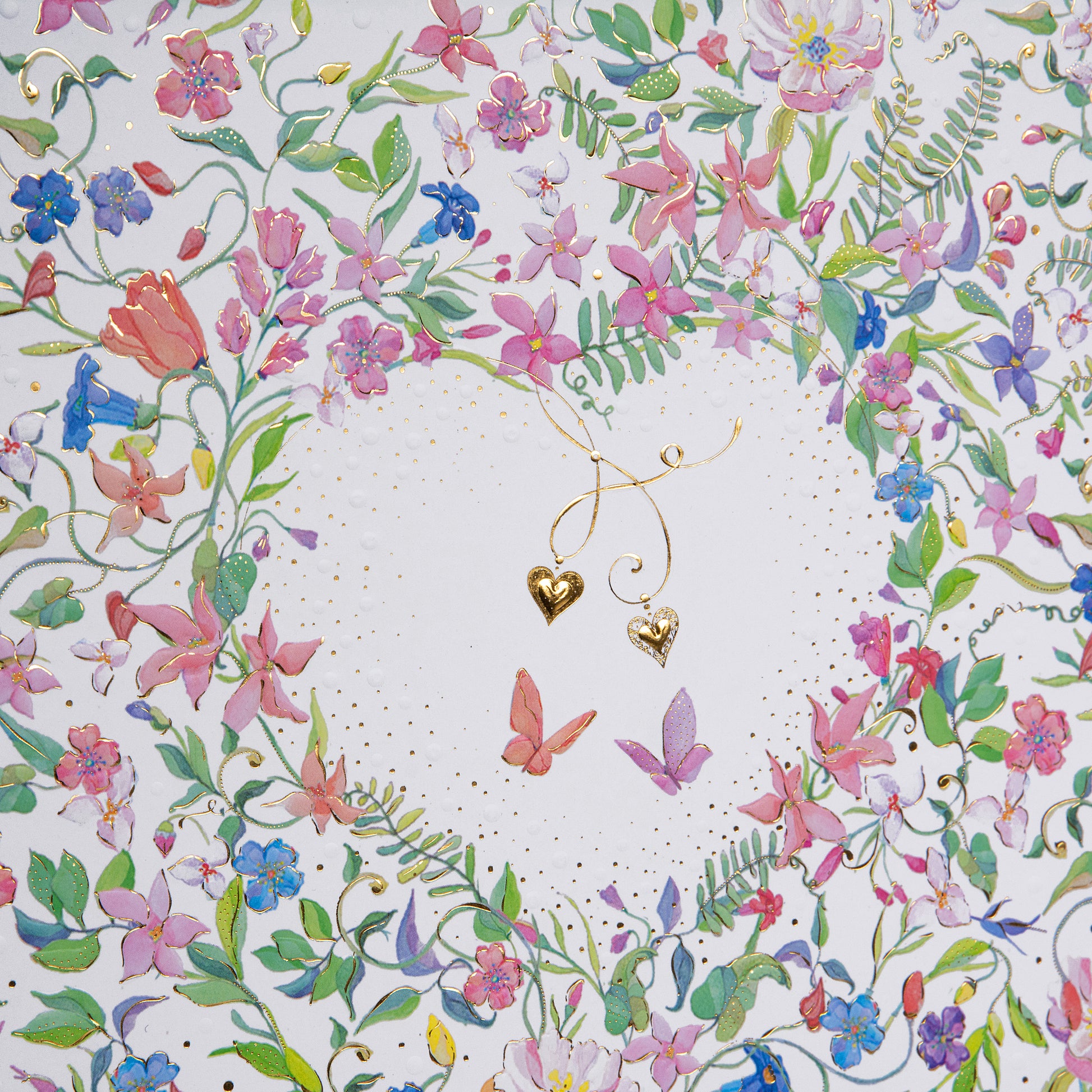 A beautiful Goldbuch wedding photo album with floral patterns, hearts and butterflies