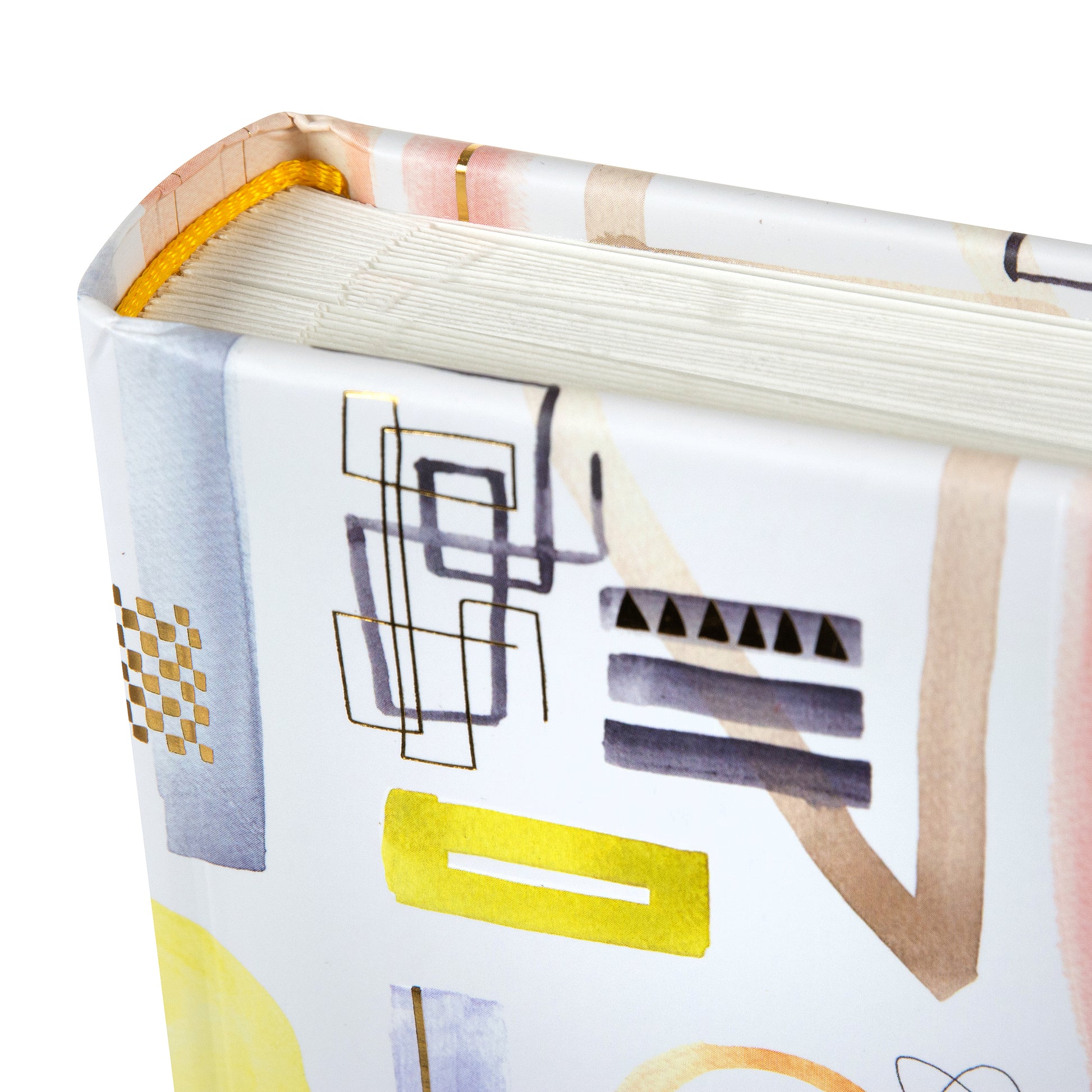 A Goldbuch photo album, white with vibrant geometric patterns, ideal for organizing and displaying photos.