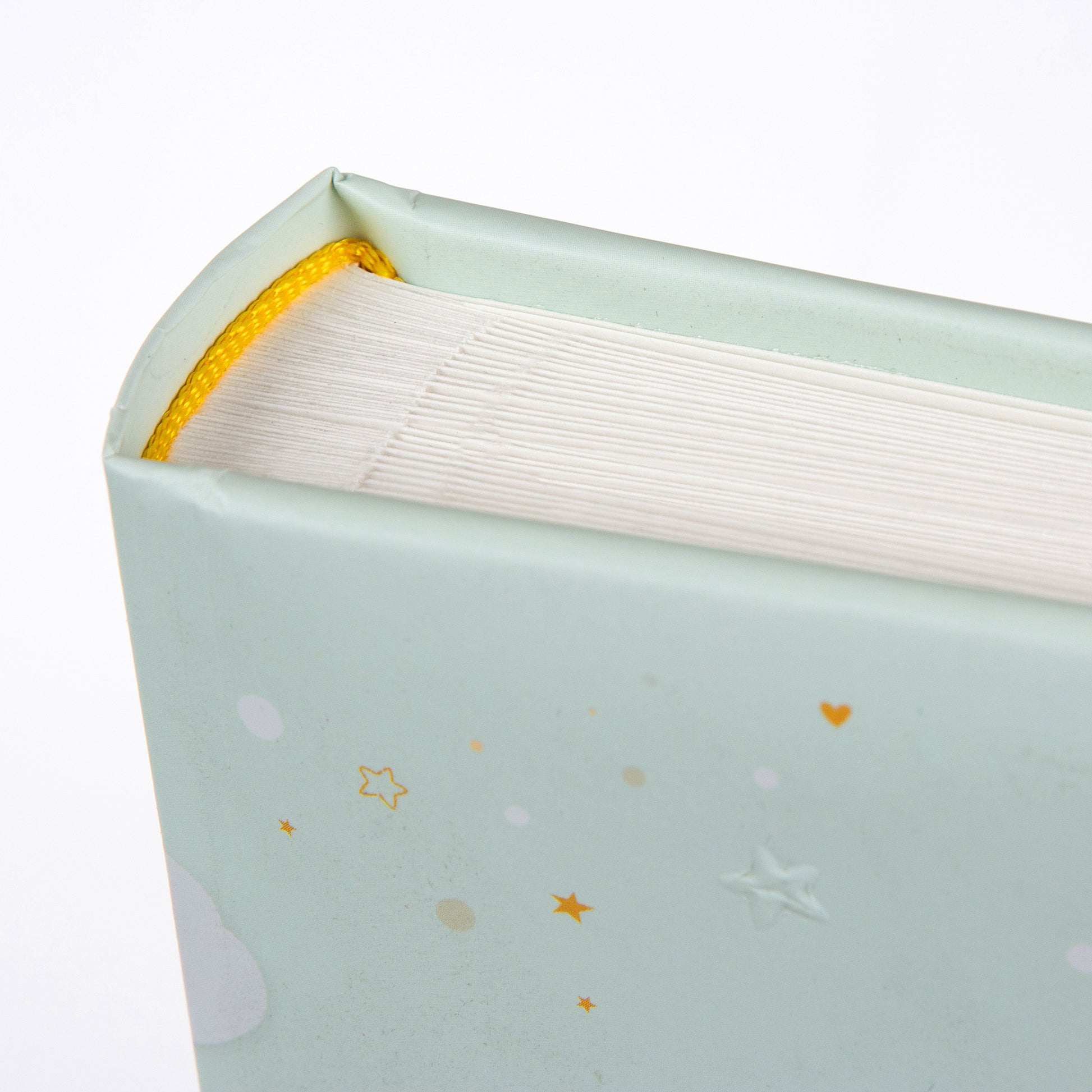 Goldbuch baby photo album showcasing a cheerful bunny and a vibrant rainbow on its cover, perfect for capturing memories.