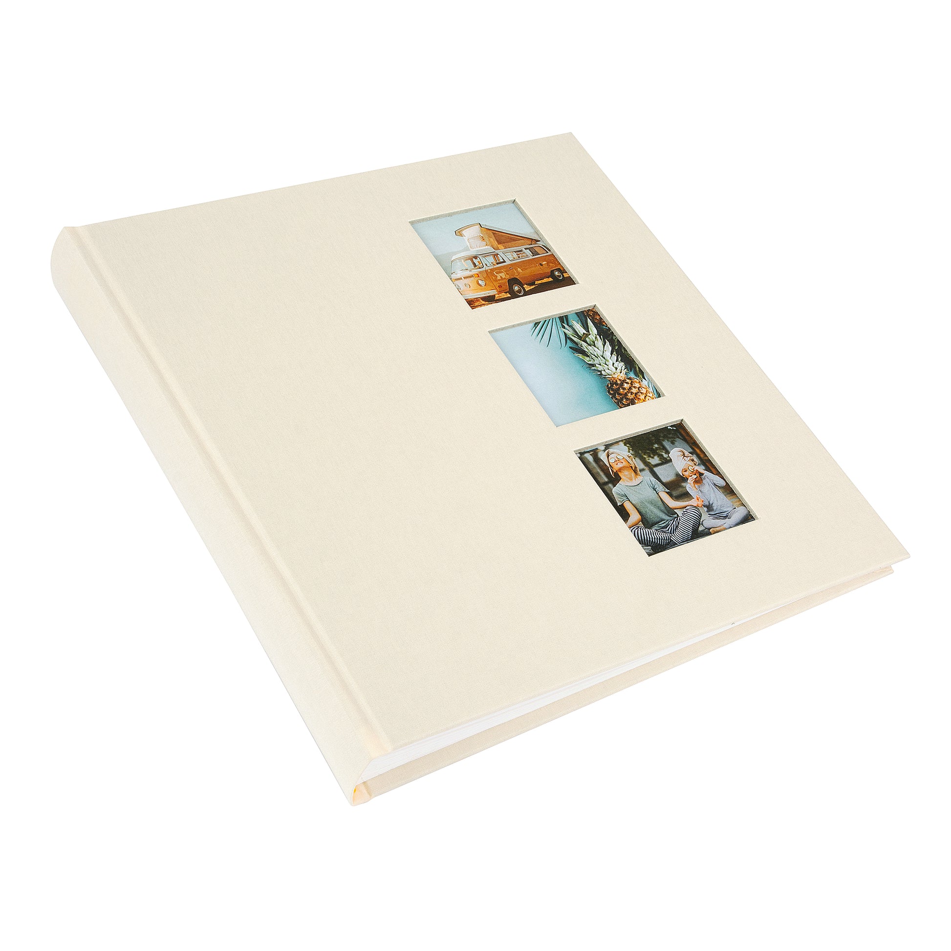 A Goldbuch photo album with three photographs showcased on its surface.