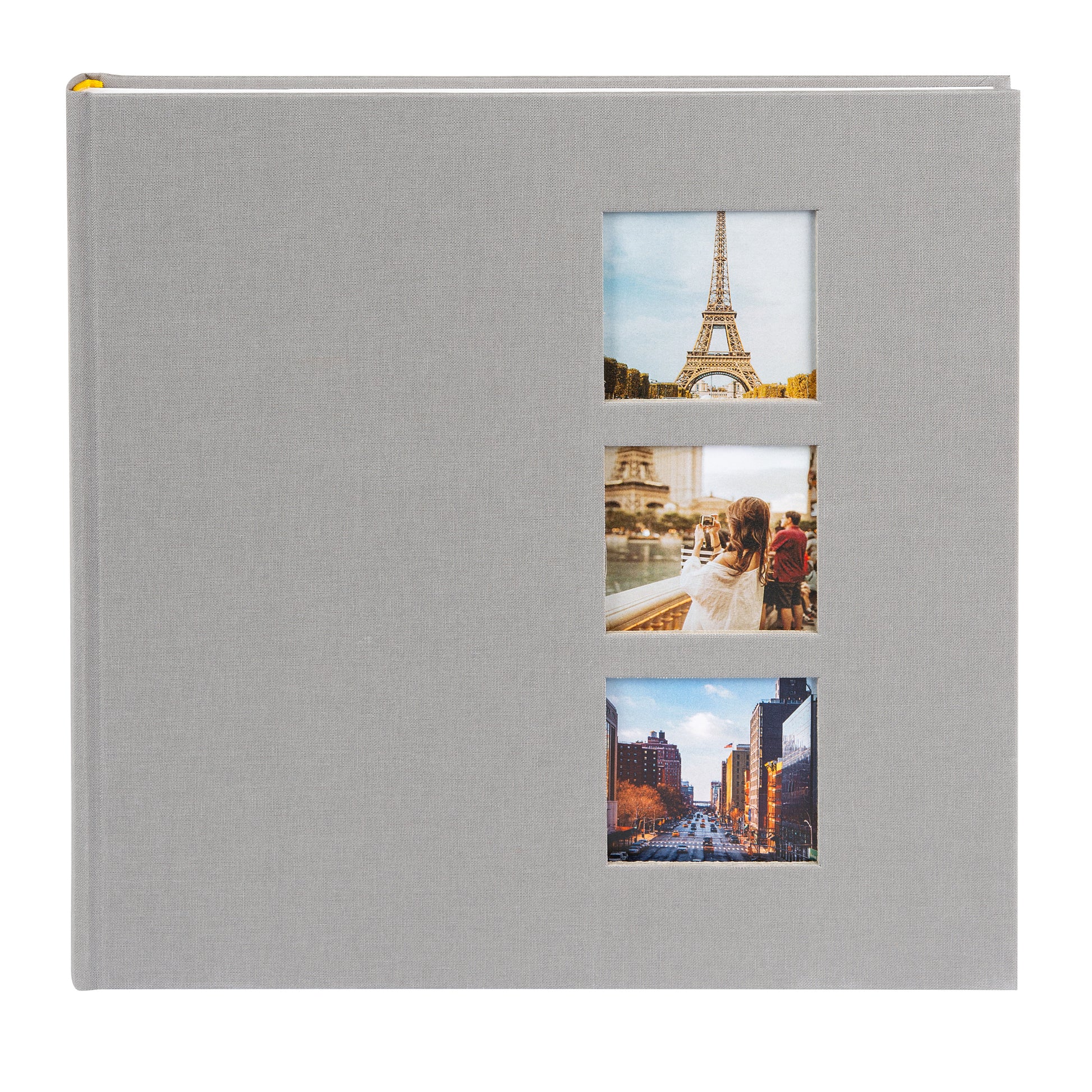 Grey Goldbuch photo album with cut-out sections displaying images of the Eiffel Tower and other scenes.