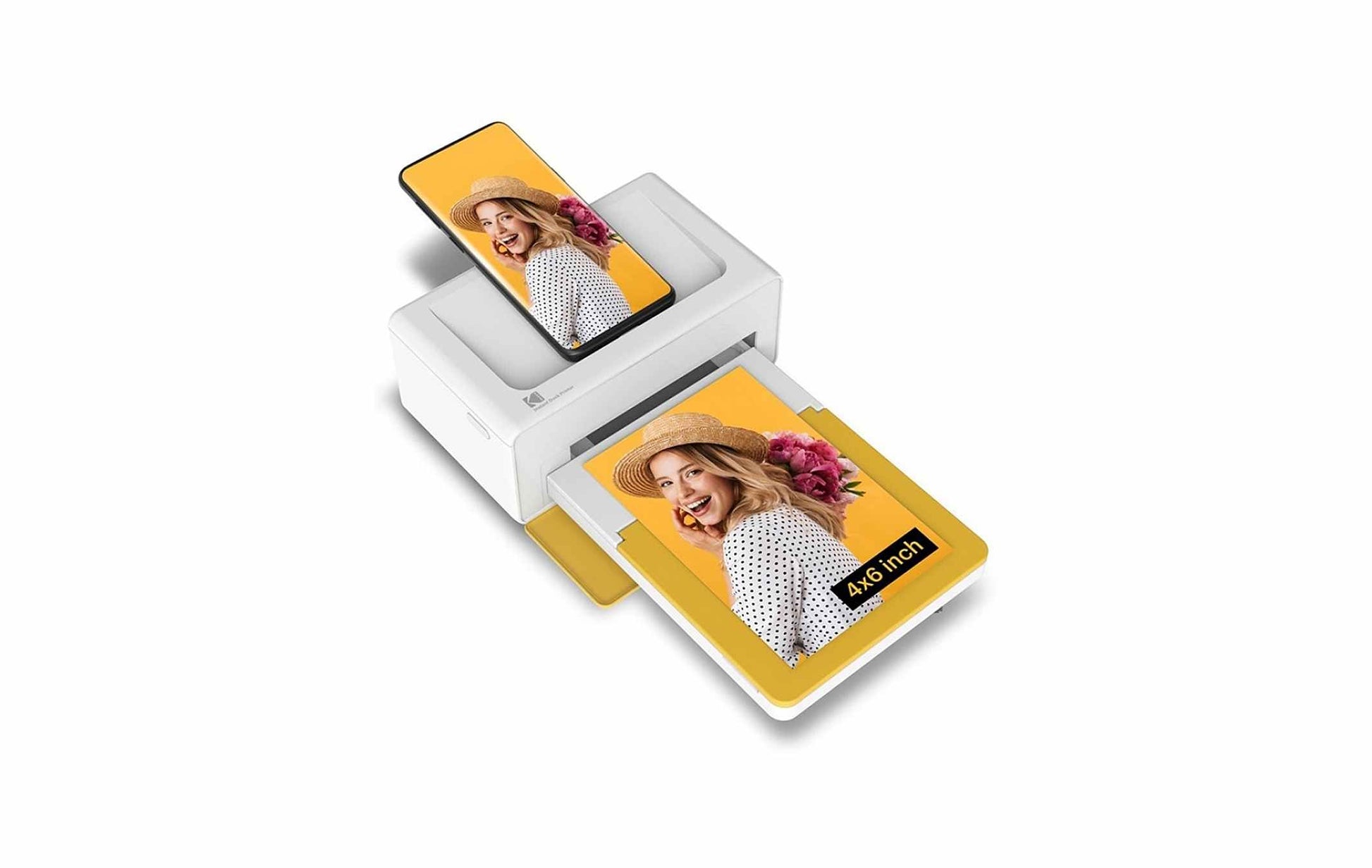 A woman displays a photo just printed from a Kodak instant printer, highlighting the joy of instant photography.