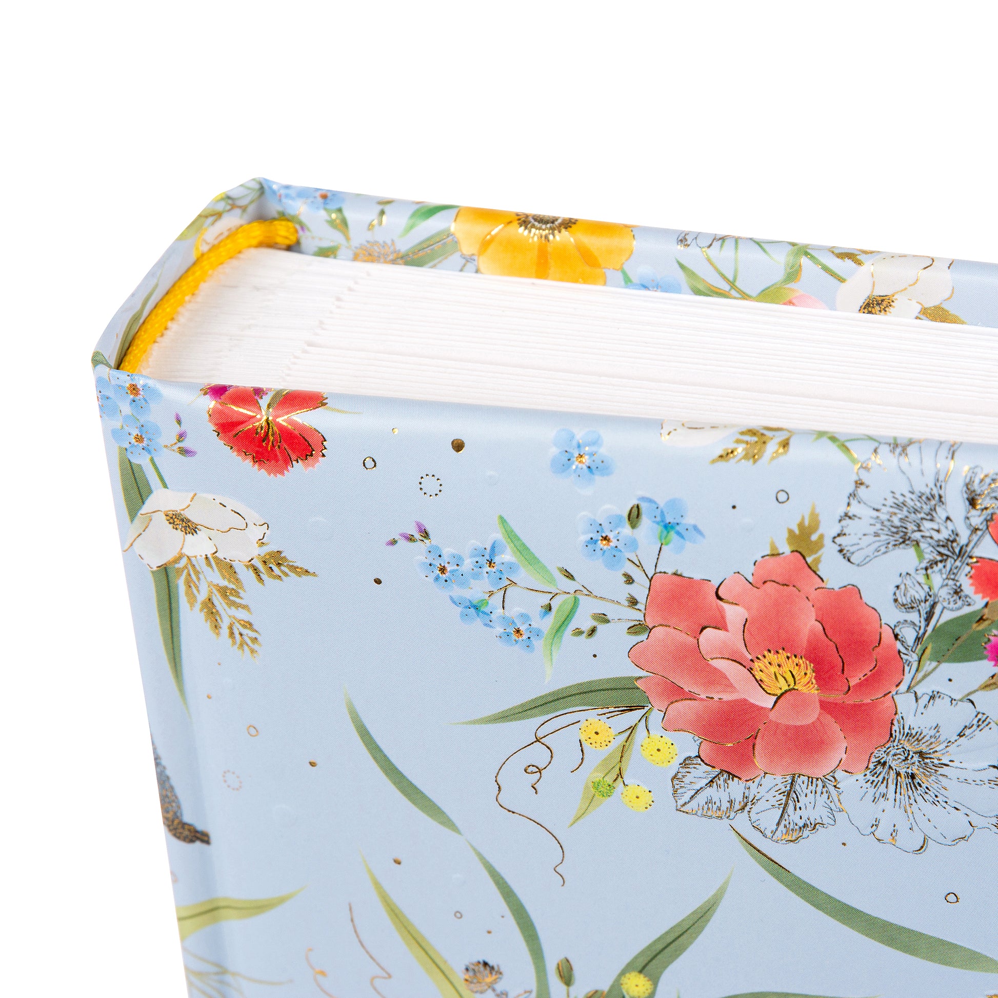 A Goldbuch photo album with a flower illustration on a light blue cover, showcasing its hardcover design and white pages.