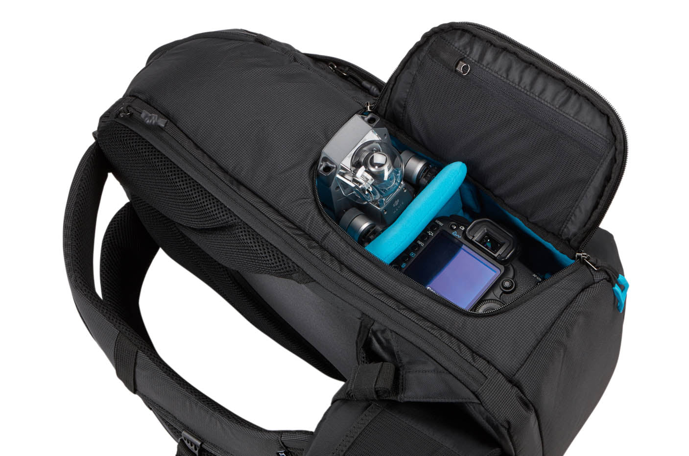 Versatile Thule DSLR camera backpack provides fully customizable storage, quick access to gear and a comfortable carry in any environment.
