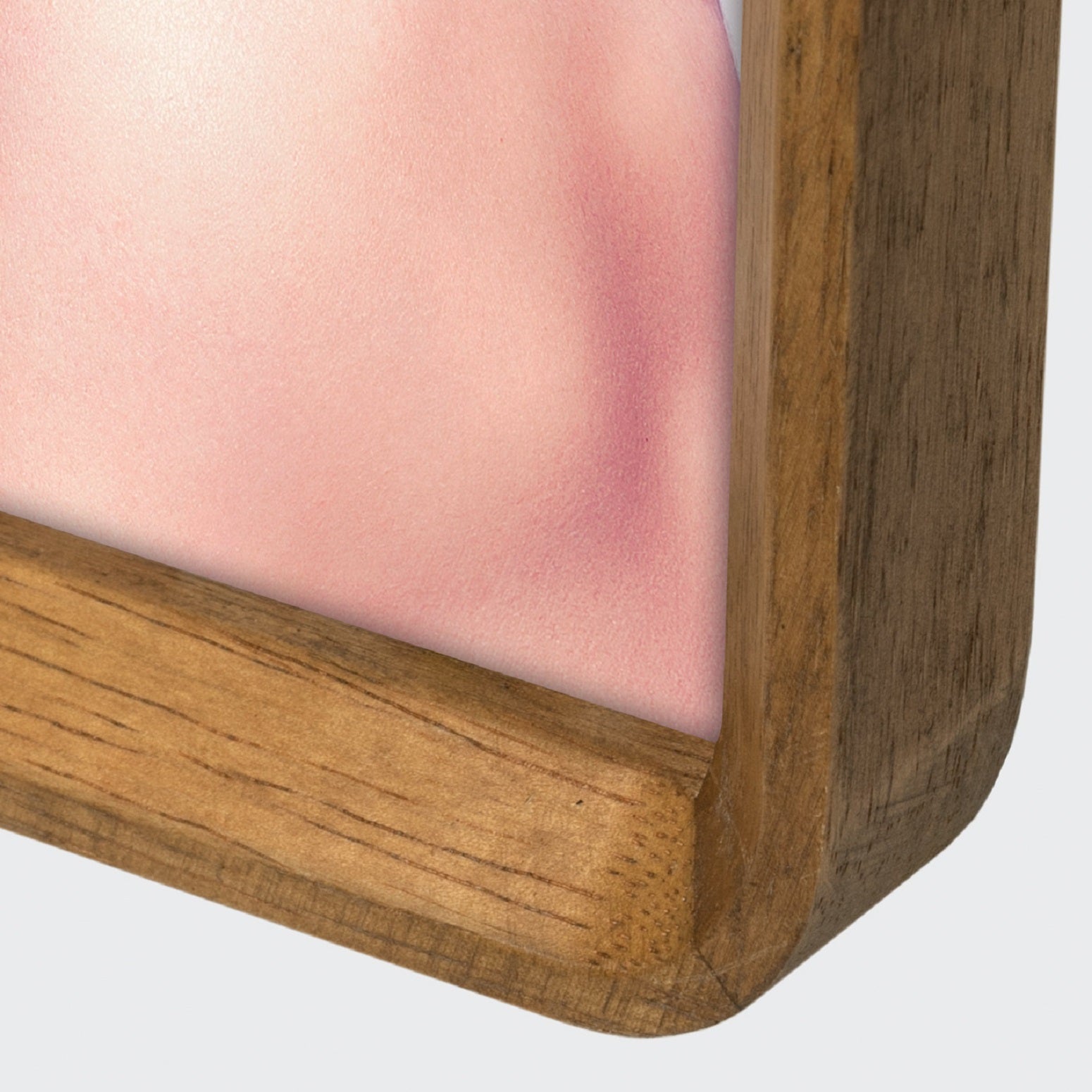 A ZEP wooden photo frame displaying a portrait of a woman, elegantly showcasing her image.