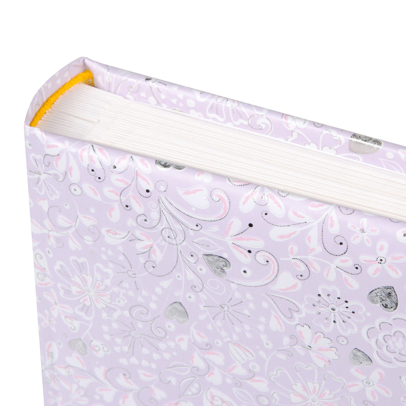 An elegant Goldbuch photo album with a lilac heart pattern, suitable for adding charm to a photo album collection.