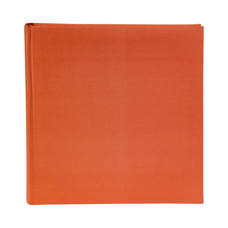 A red Goldbuch photo album resting on a white background, showcasing its vibrant color and sleek design.