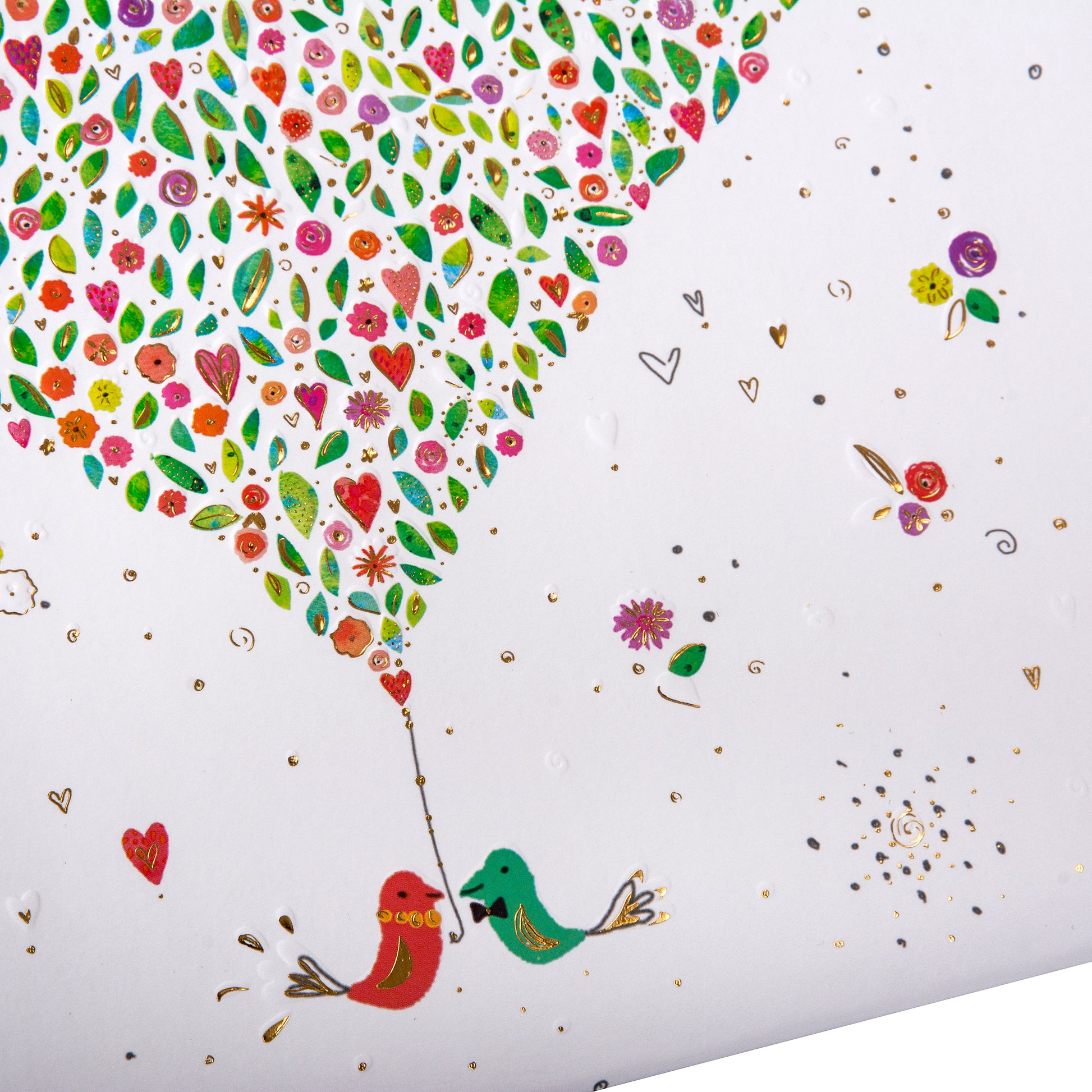 A Goldbuch photoalbum with a heart motif and vibrant hearts, perfect for storing cherished memories.