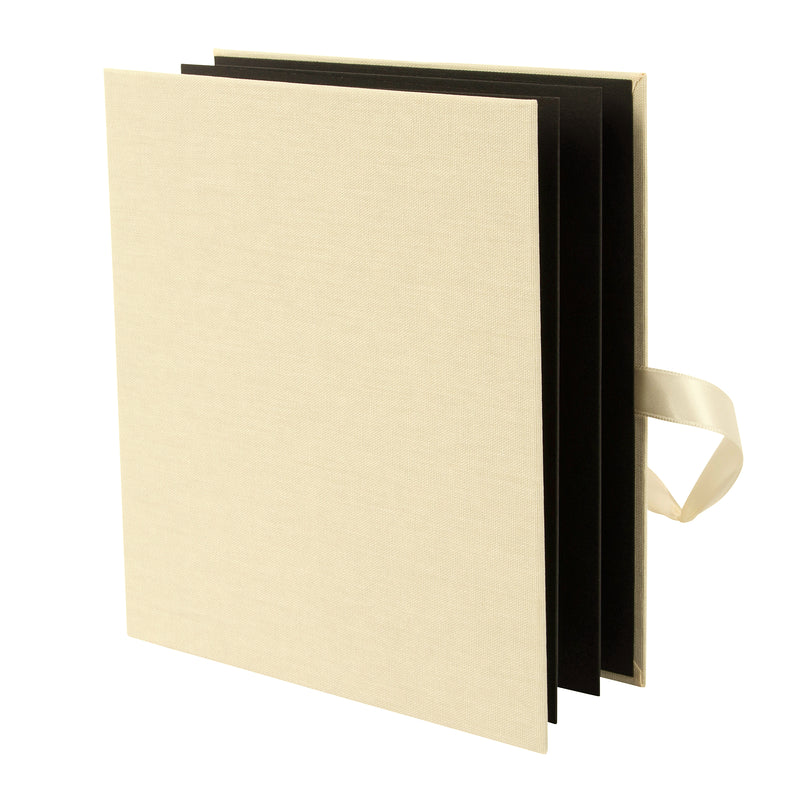  A beautifully crafted cream Goldbuch leporello featuring a charming bow.