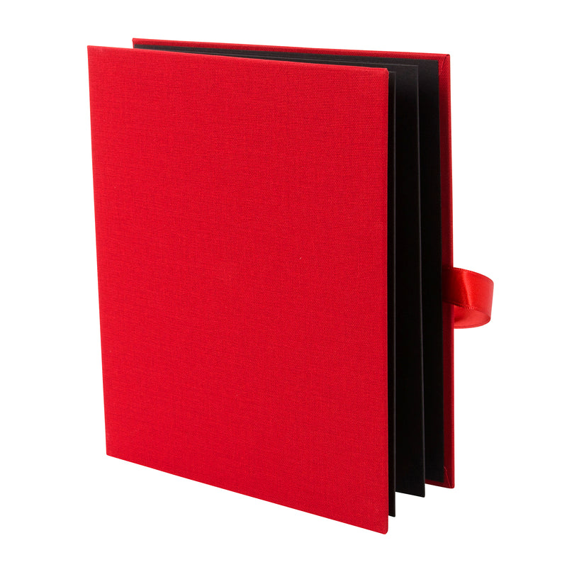 A beautifully crafted red Goldbuch leporello featuring a charming red bow.