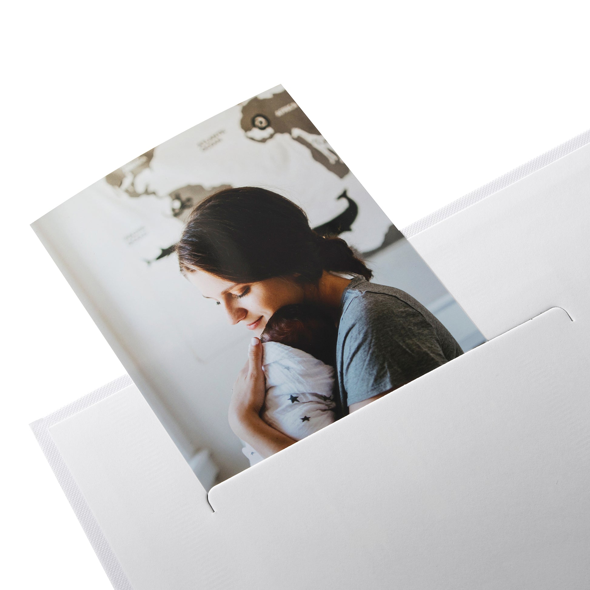 A Goldbuch delightful baby photo album illustrated with fluffy clouds, hearts and bright rainbows, showcasing treasured early moments.