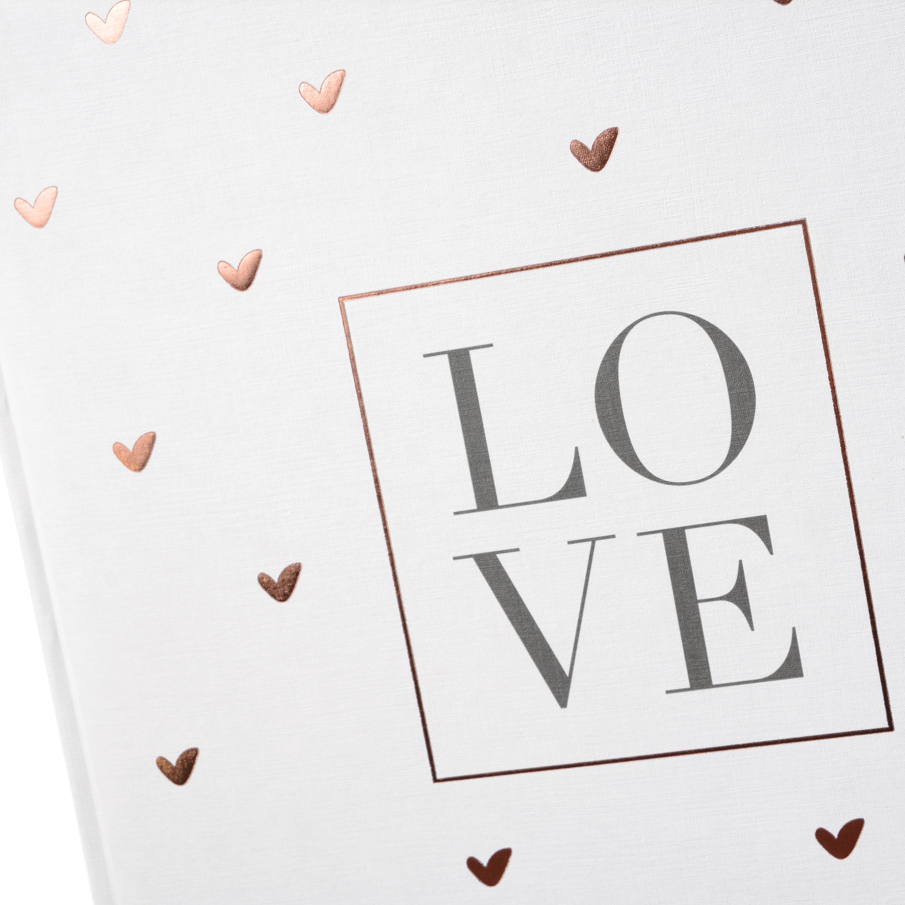 A white Goldbuch wedding photo album with a heart-shaped design pattern, symbolizing love and celebration.