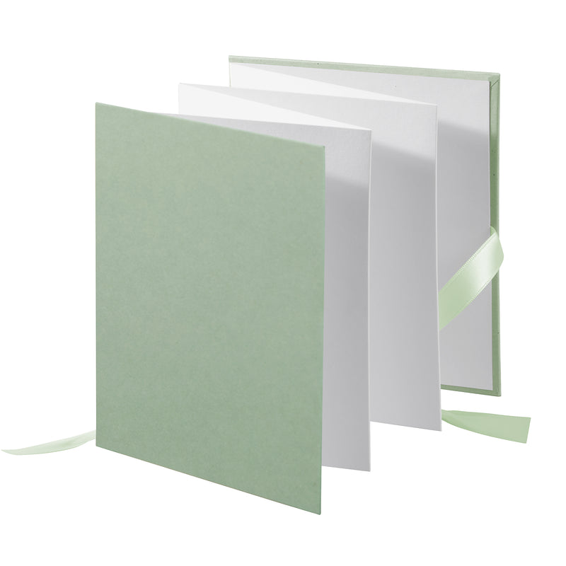  A beautifully crafted pastel green Goldbuch leporello featuring a charming light green bow.