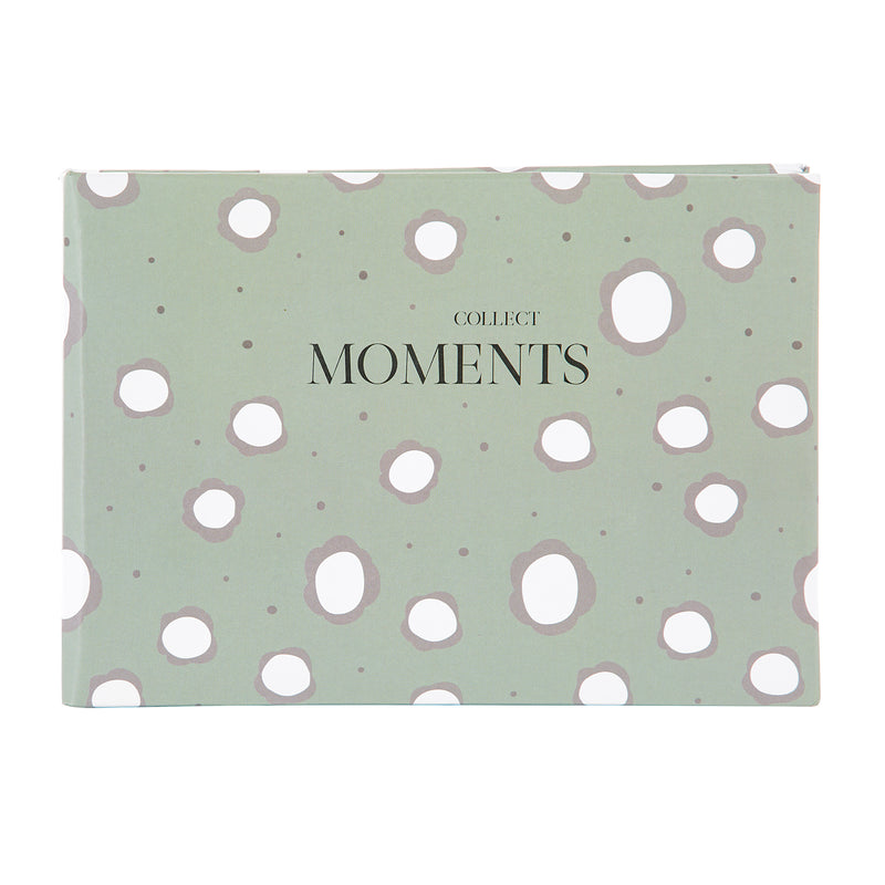 A multicolored Goldbuch photo album with elegant floral pattern.