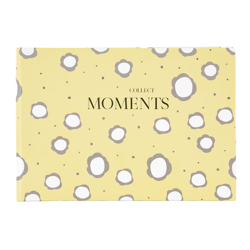 A multicolored Goldbuch photo album with elegant floral pattern.