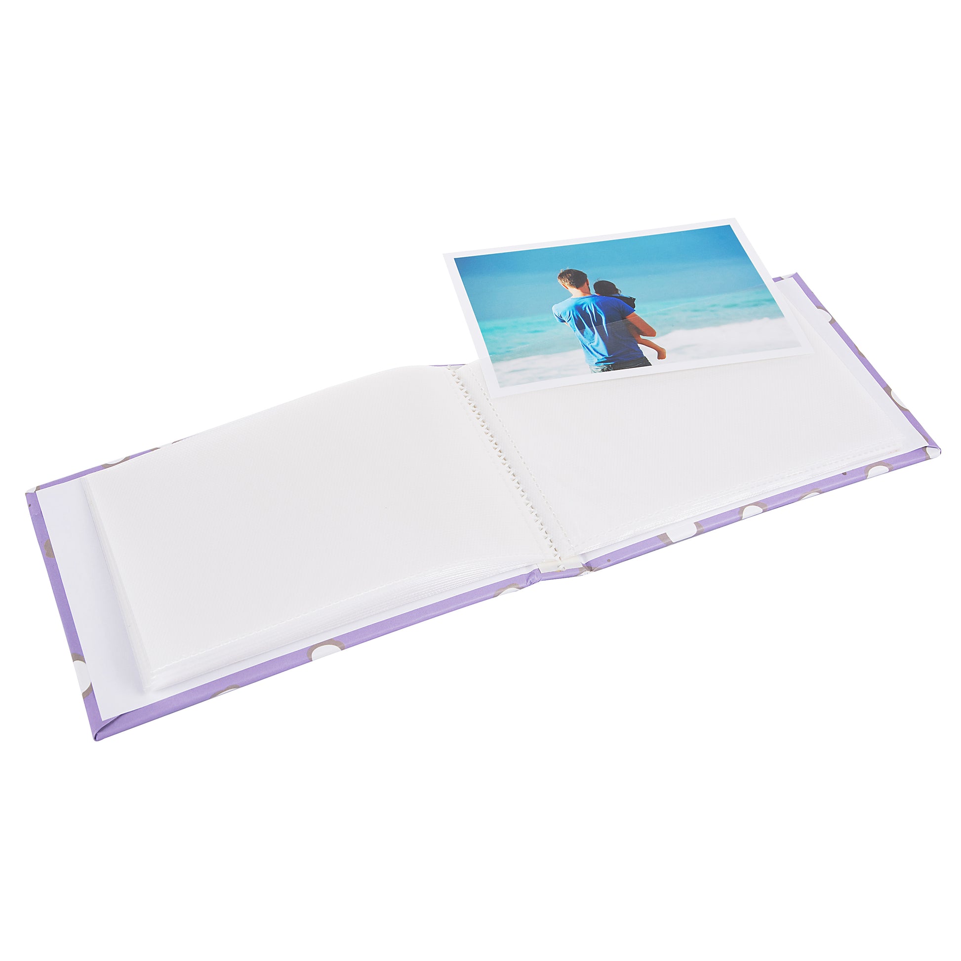 A Goldbuch photo album page, elegantly presenting treasured memories in a stylish and organized manner.
