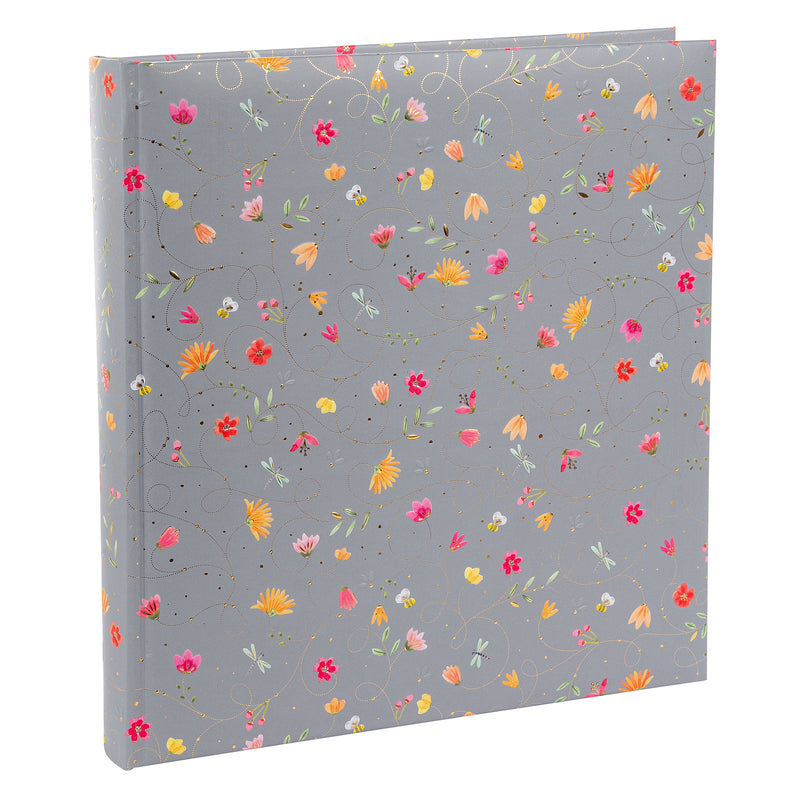 A grey Goldbuch photo album notebook adorned with vibrant flowers, showcasing creativity and personal expression.