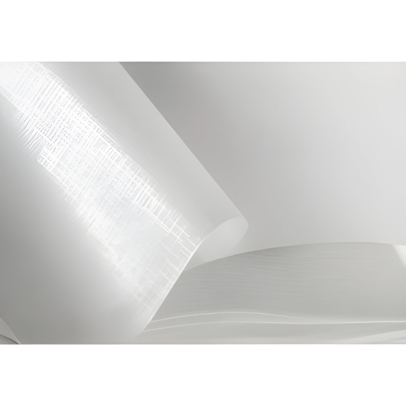 A white paper sheet set on a white background, with glassine interleaves ensuring protection and visibility of the following pages.