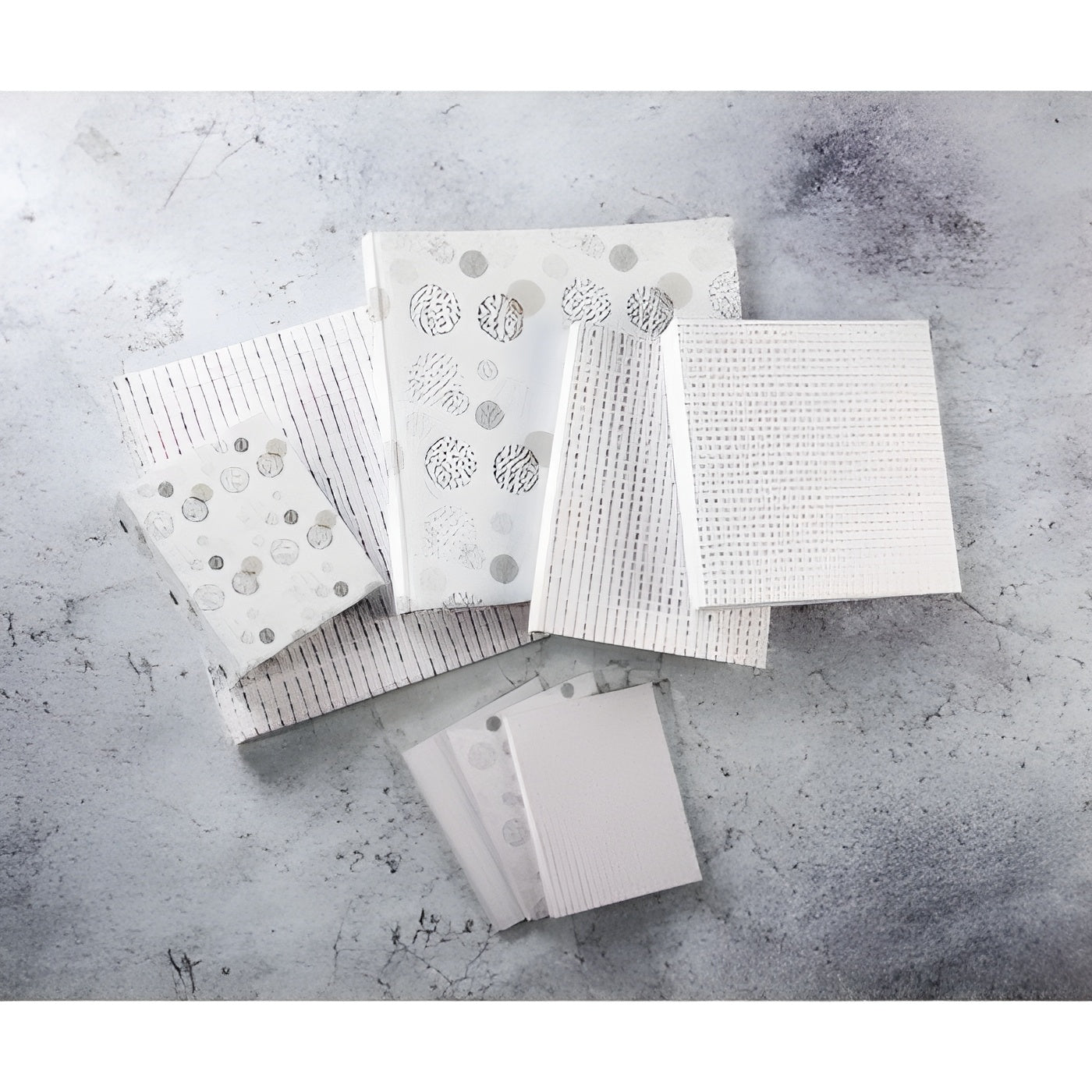 Elegant album with dot patterns, showcasing a sophisticated design by Hama for a modern touch.