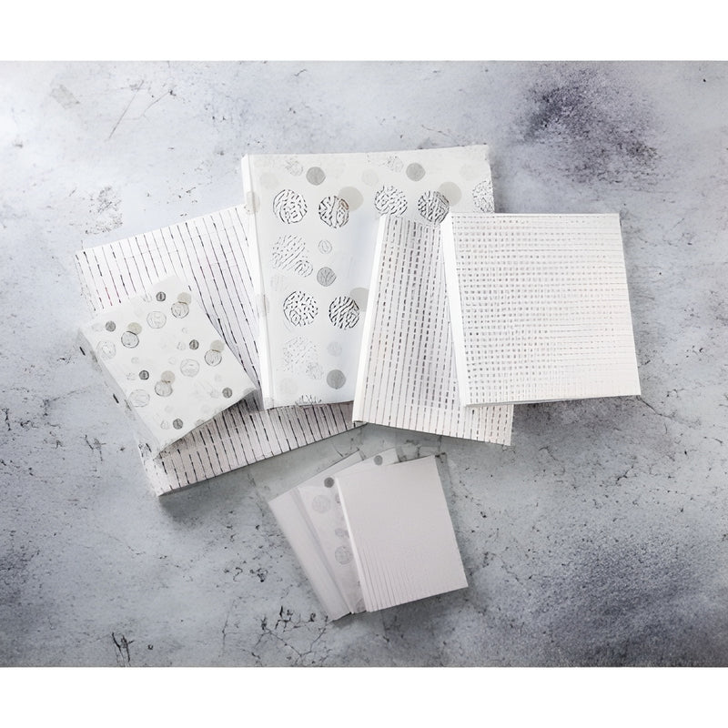 Elegant album with dot patterns, showcasing a sophisticated design by Hama for a modern touch.