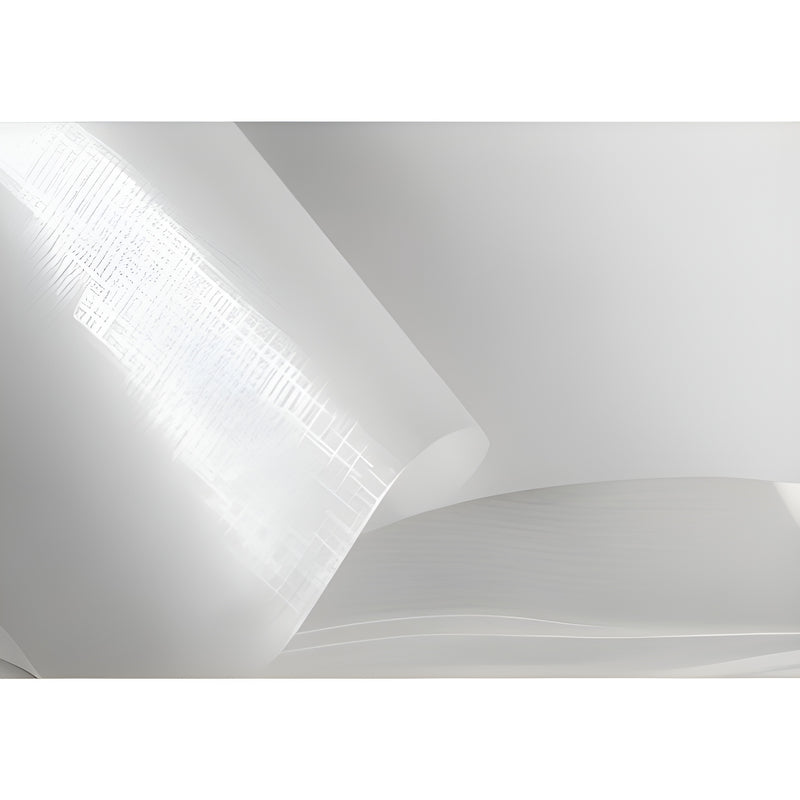 Hama photo album. A white paper sheet set on a white background, with glassine interleaves ensuring protection and visibility of the following pages.