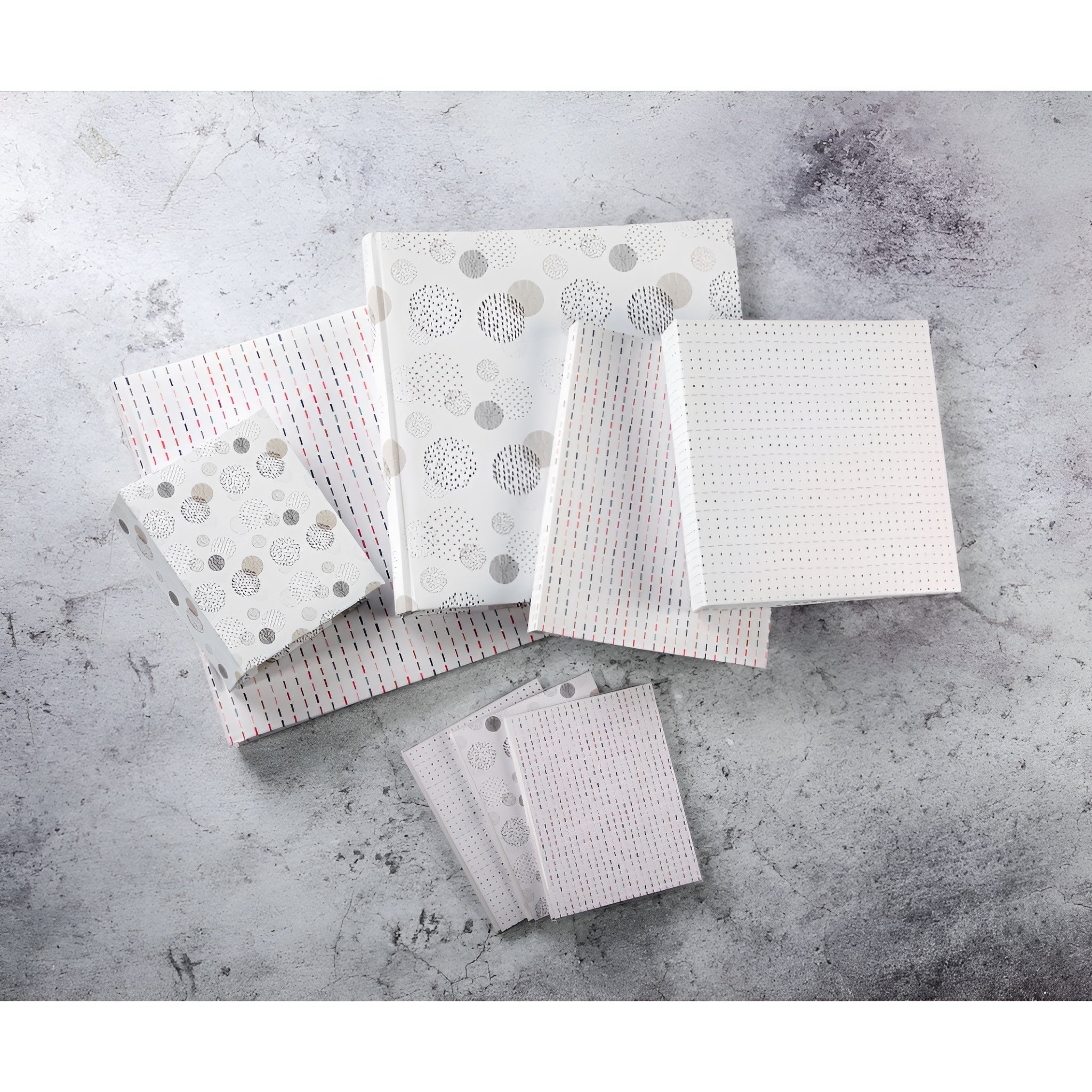A Hama photo album with colorful graphic squares and lines pattern.