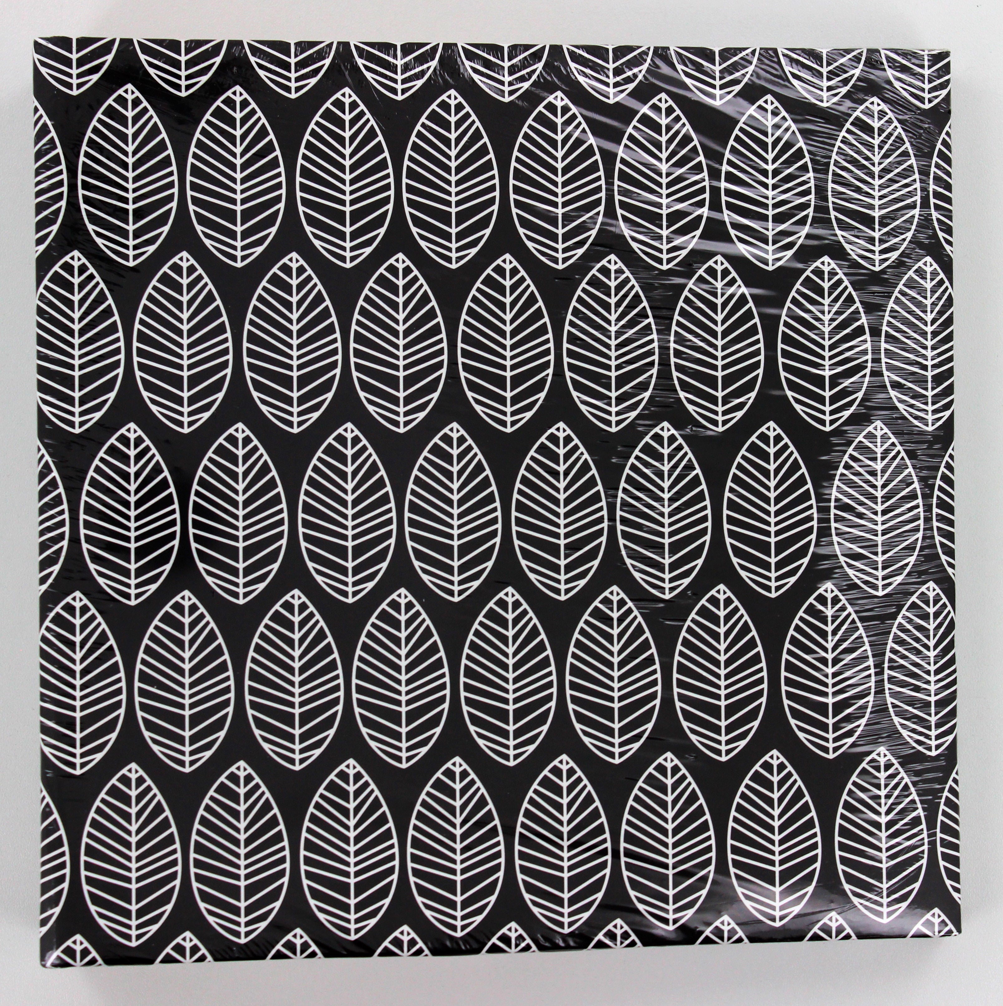 A Hama photo album with an elegantly presented white and black leaf pattern.