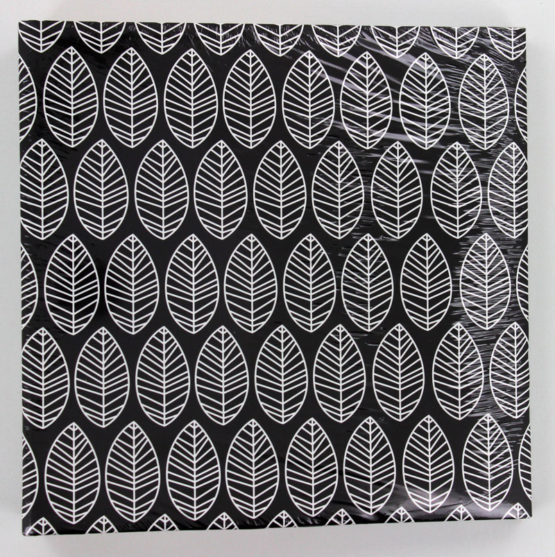 A Hama photo album with an elegantly presented white and black leaf pattern.