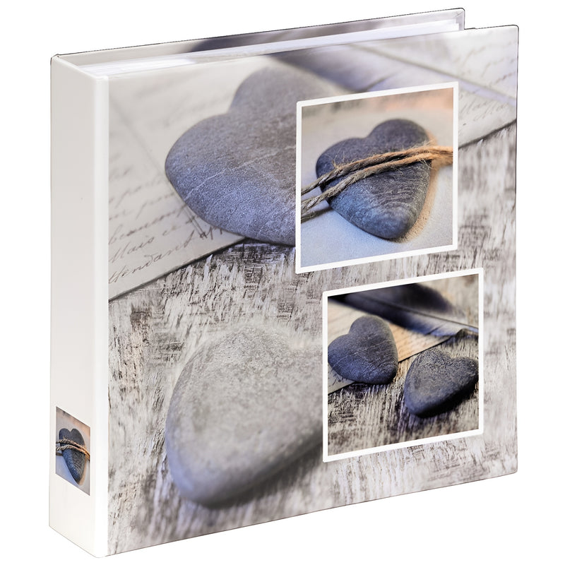 A binder from Hama Photo Album showcasing two images: a heart and a stone, elegantly presented.