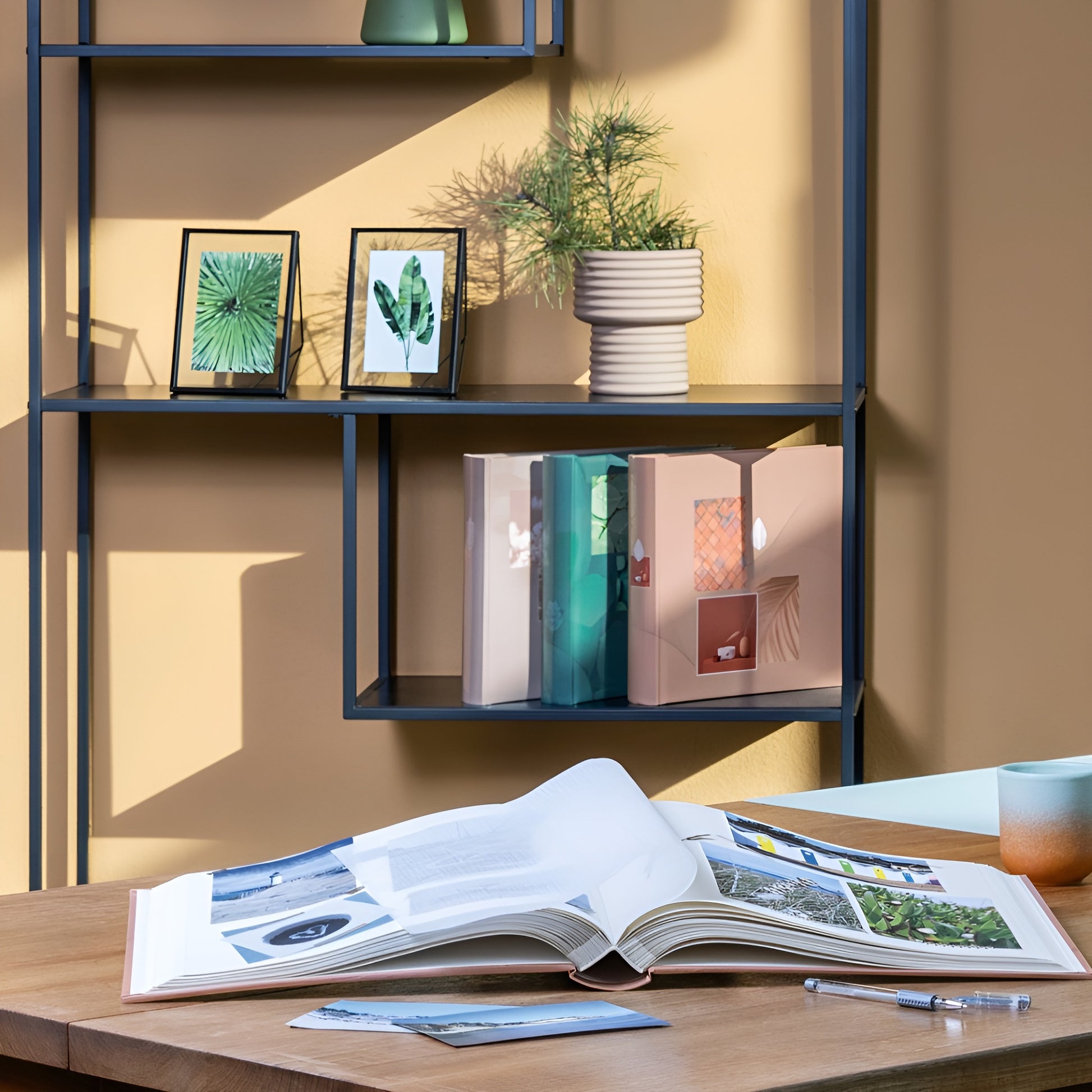 Hama photo album in a white binder adorned with a floral design, perfect for storing and showcasing photographs.
