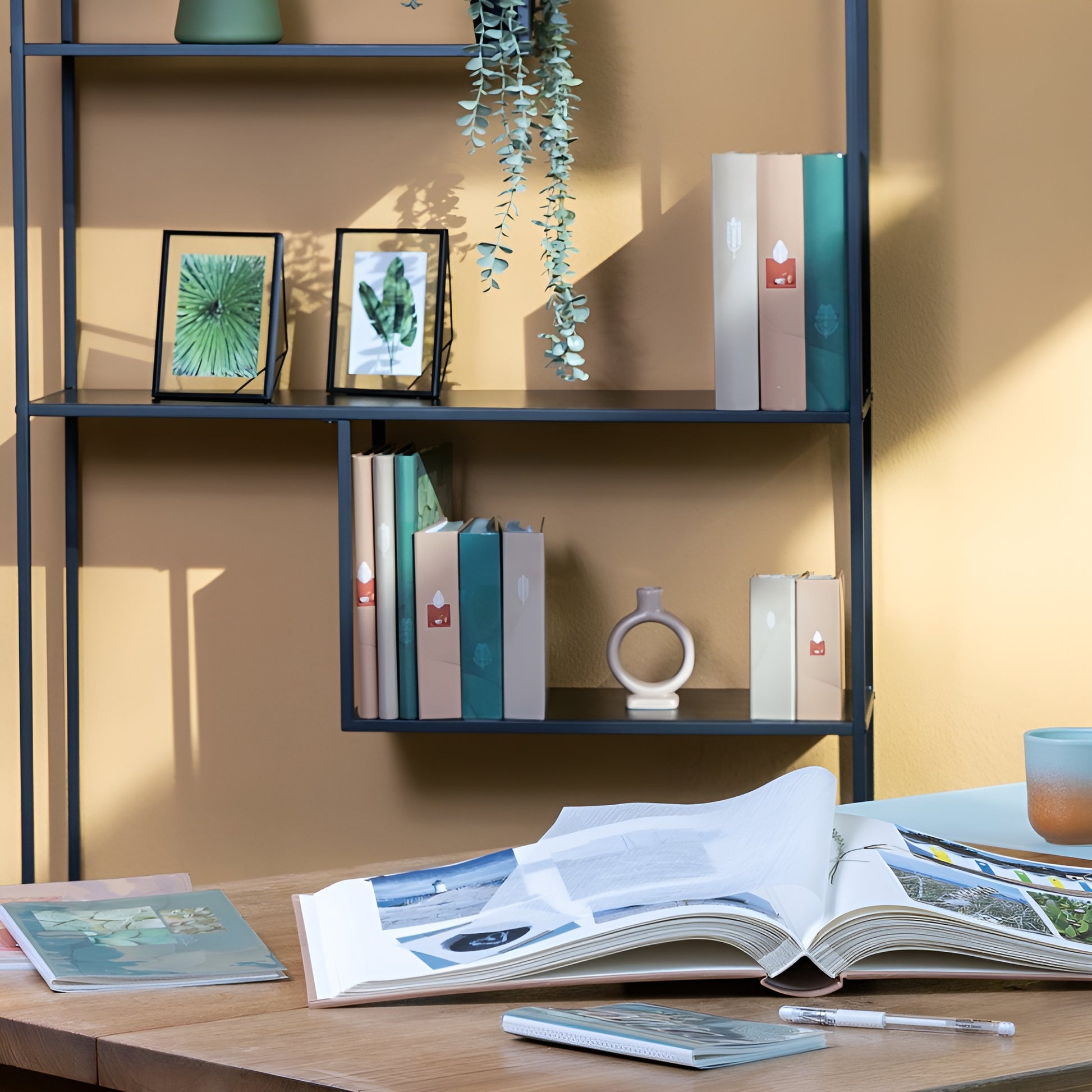 Hama photo album in a white binder adorned with a floral design, perfect for storing and showcasing photographs.