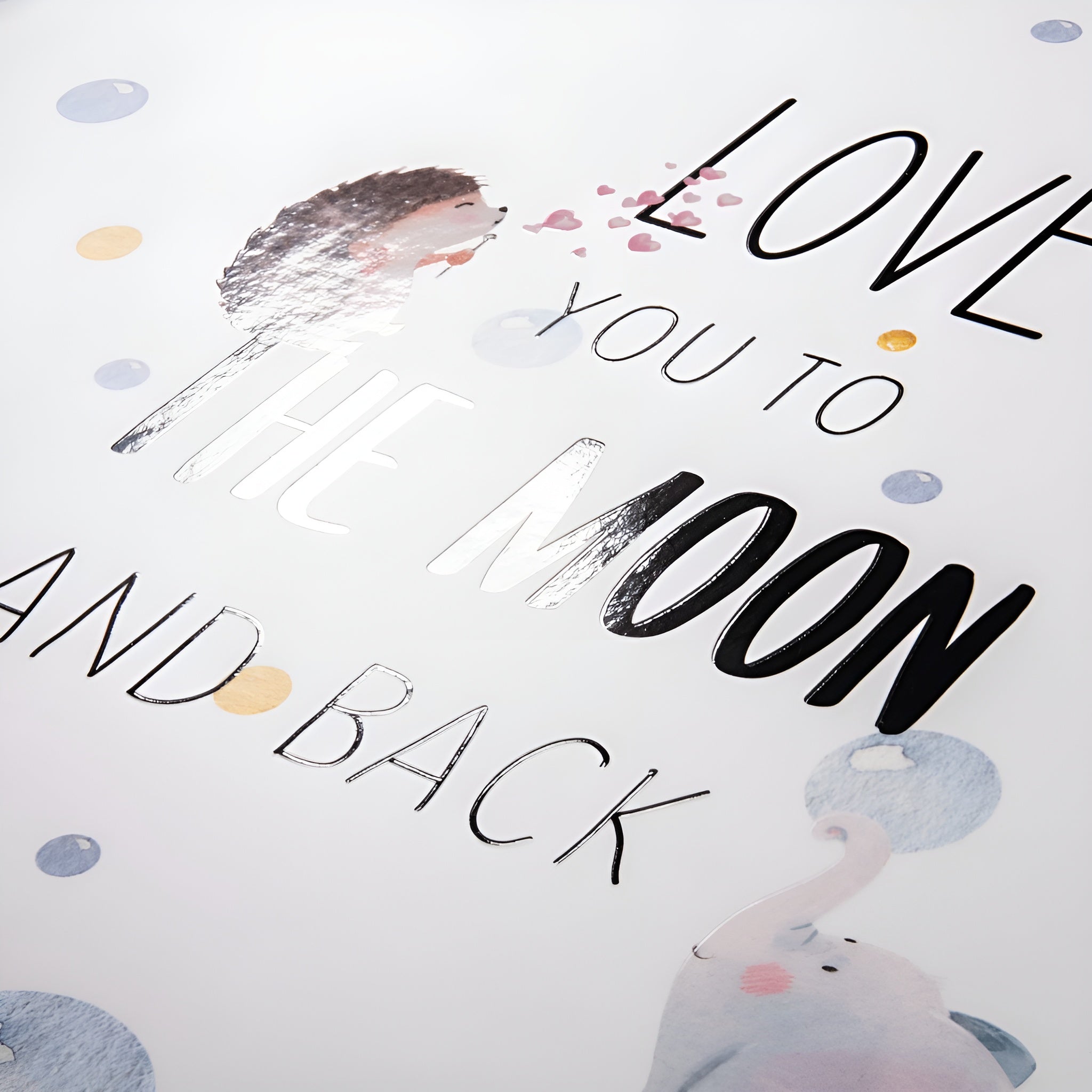 Hama photo album cover featuring the phrase "love you to the moon and back" with decorative elements.