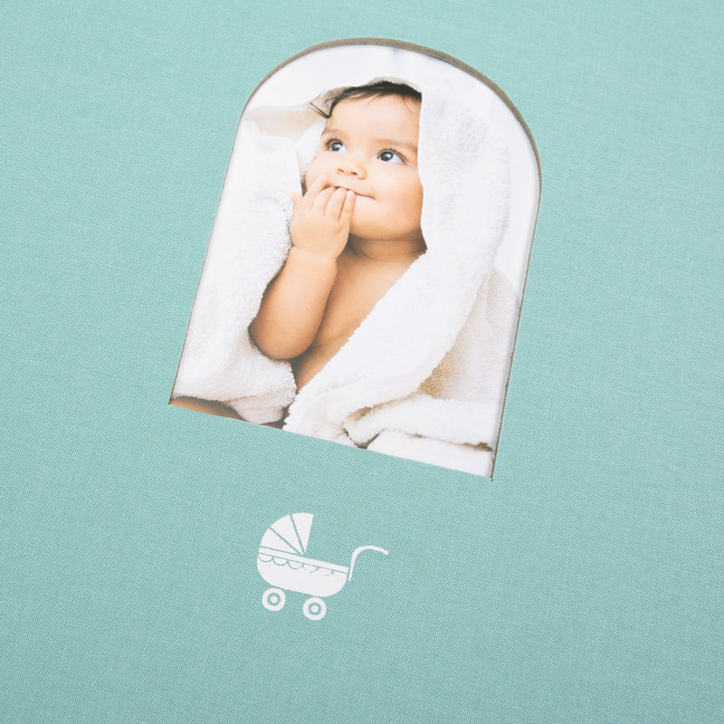 Light blue Goldbuch photo album with a cutout featuring a baby, on a white background