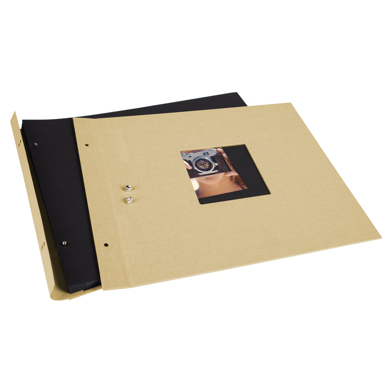 A Goldbuch beige photo album with a cover illustration of a woman taking photos, showcasing its hardcover design and black pages.