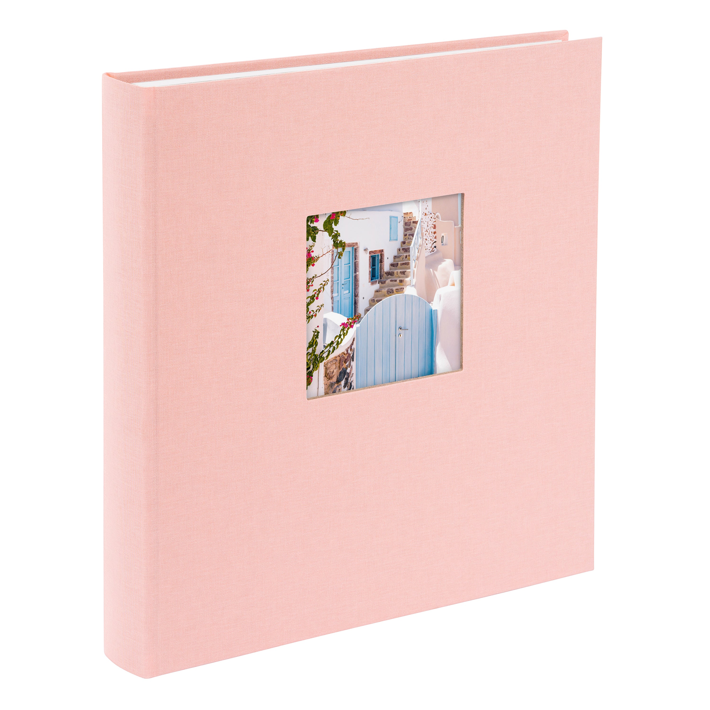 A Goldbuch rose photo album with a cover illustration of a blue wooden gate, showcasing its hardcover design and white pages.