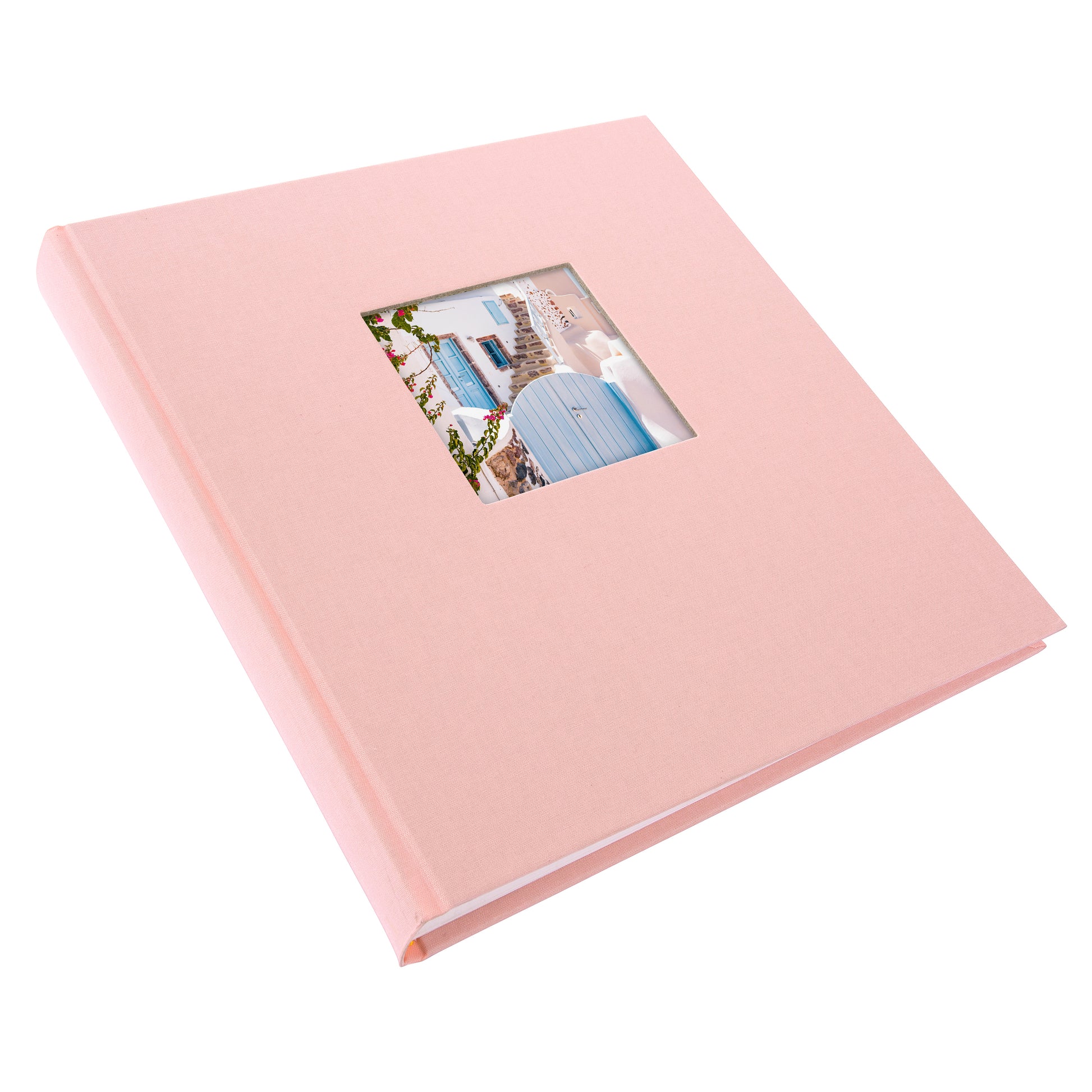A Goldbuch rose photo album with a cover illustration of a blue wooden gate, showcasing its hardcover design and white pages.