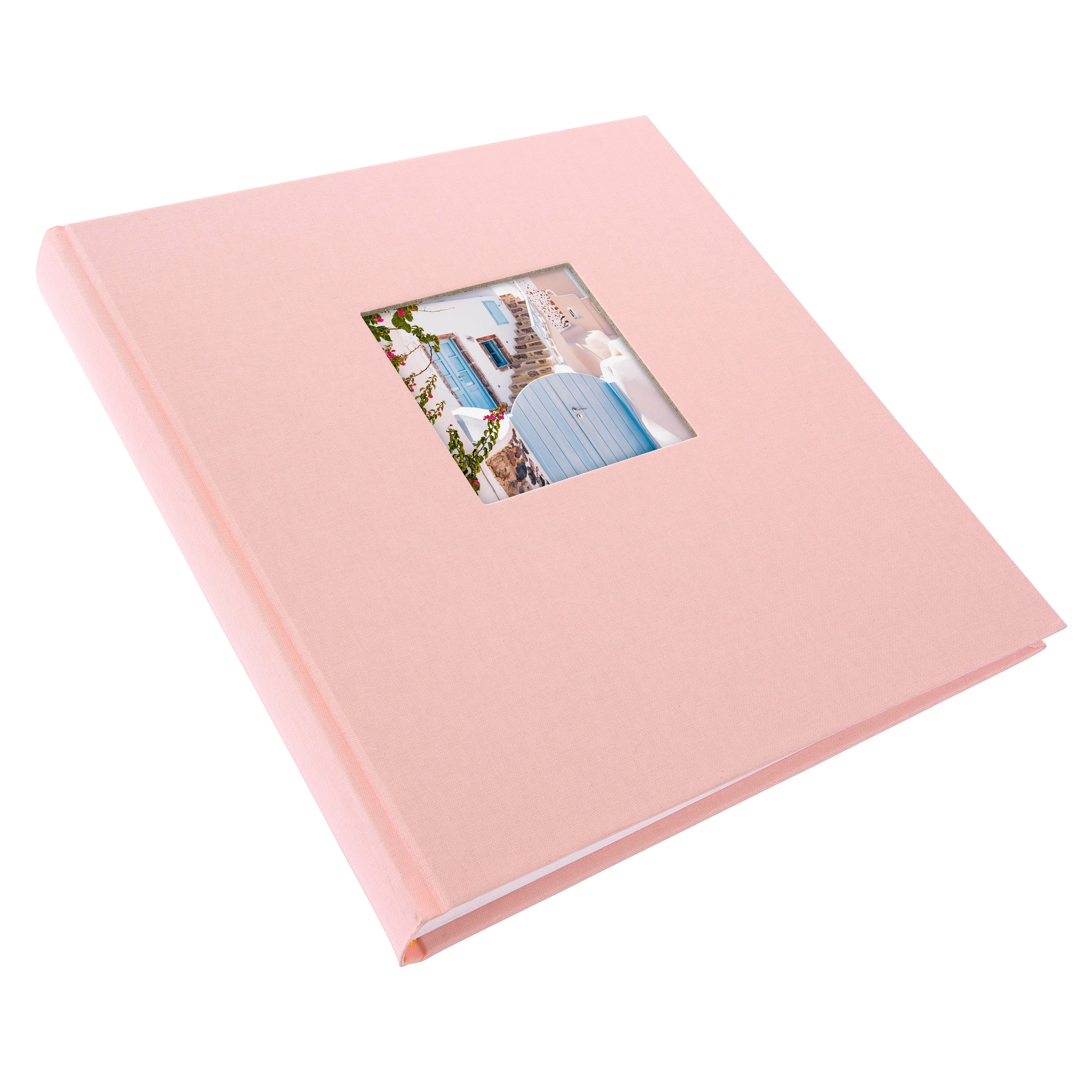 A Goldbuch rose photo album with a cover illustration of a blue wooden gate, showcasing its hardcover design and white pages.