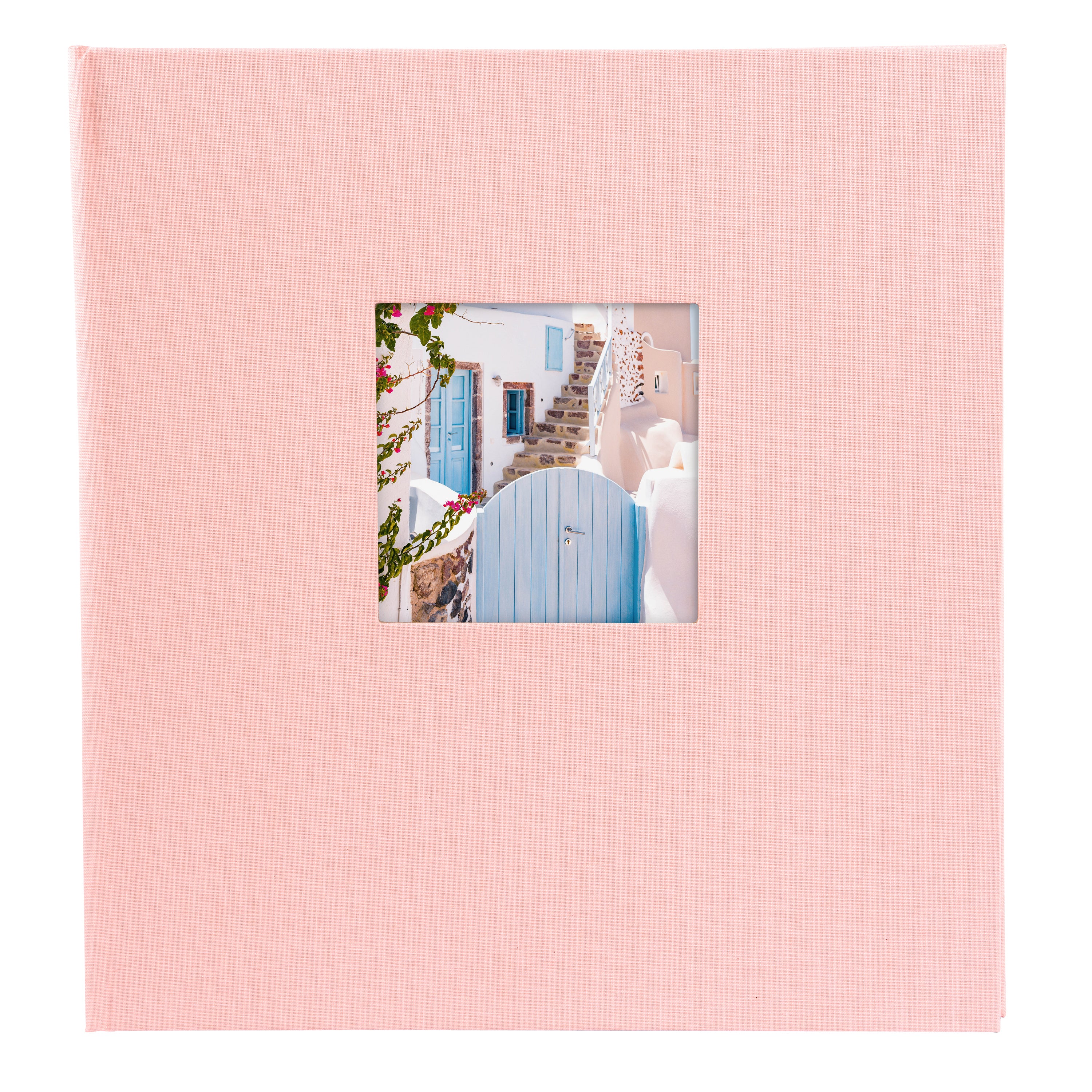 A Goldbuch rose photo album with a cover illustration of a blue wooden gate, showcasing its hardcover design and white pages.