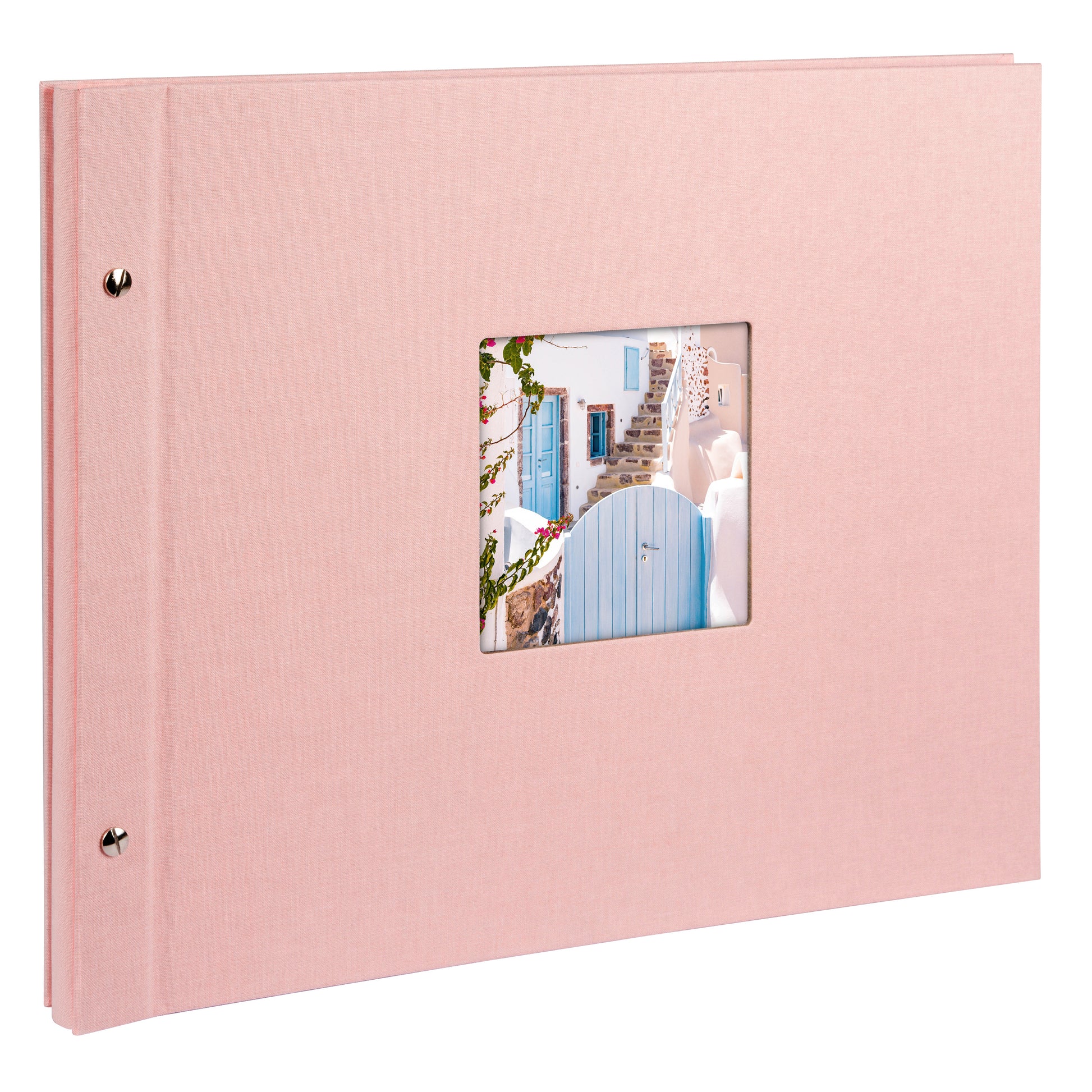 A Goldbuch rose photo album with a cover illustration of a blue wooden gate, showcasing its hardcover design and black pages.