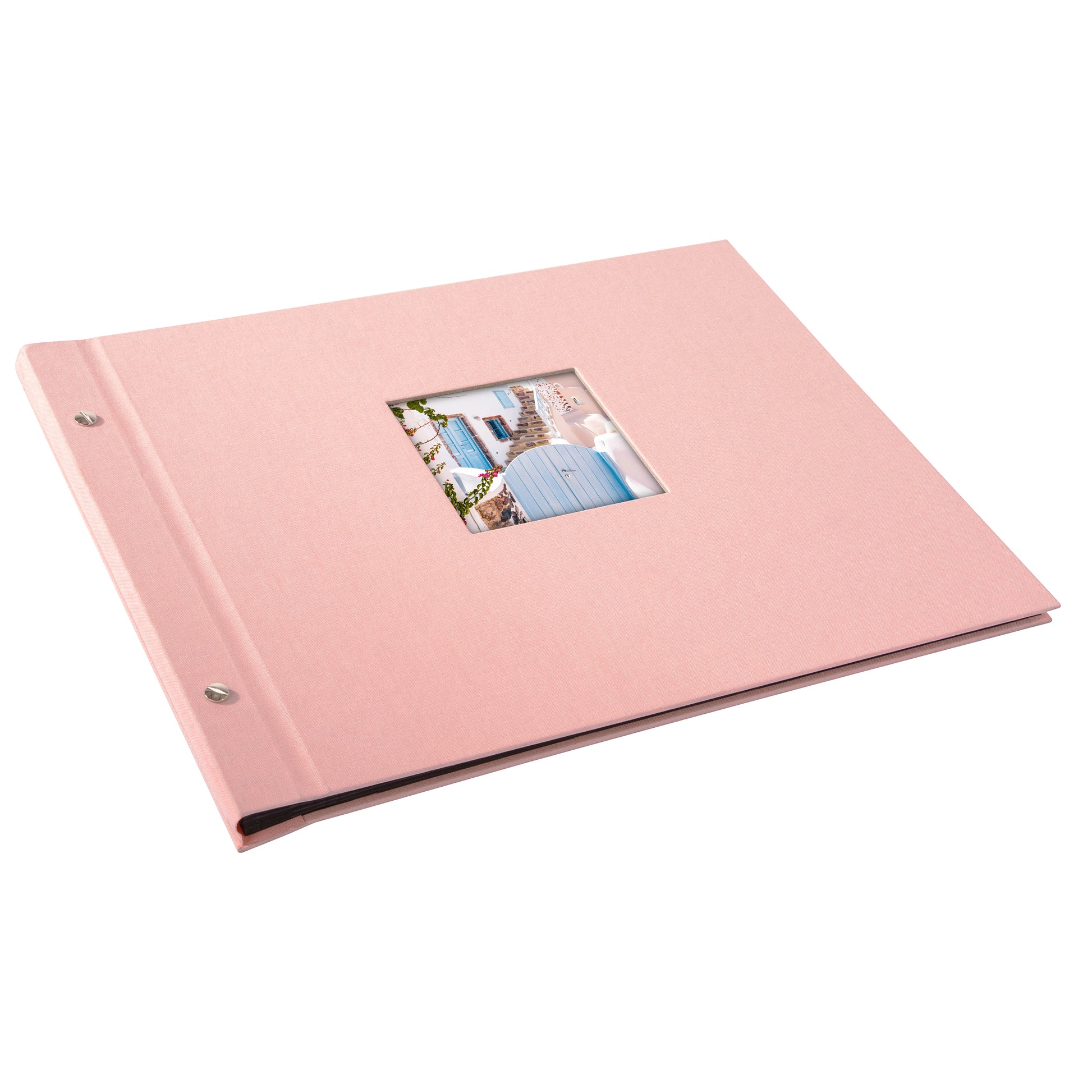 A Goldbuch rose photo album with a cover illustration of a blue wooden gate, showcasing its hardcover design and black pages.