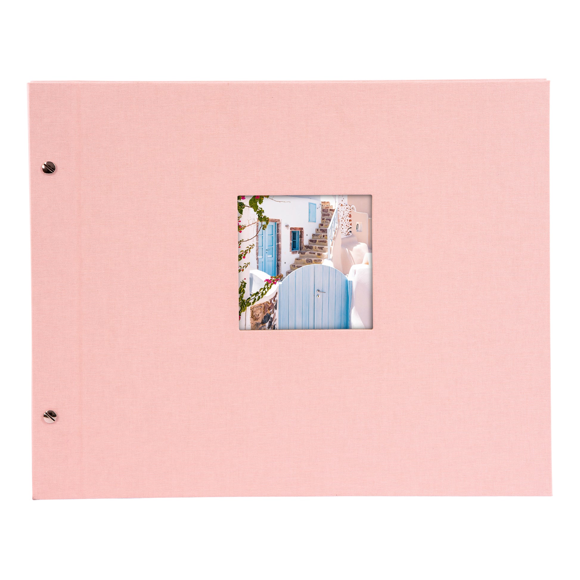 A Goldbuch rose photo album with a cover illustration of a blue wooden gate, showcasing its hardcover design and black pages.