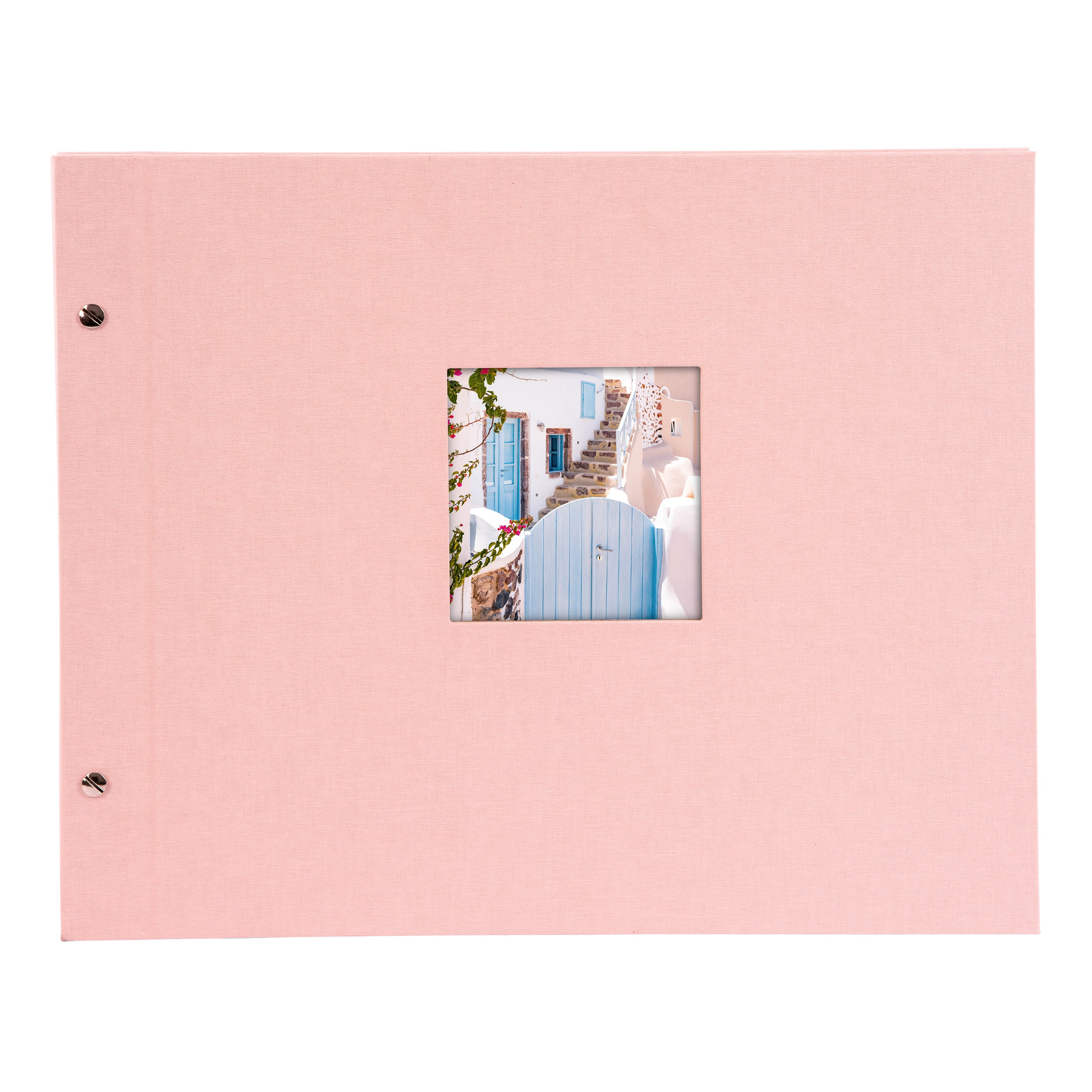 A Goldbuch rose photo album with a cover illustration of a blue wooden gate, showcasing its hardcover design and black pages.