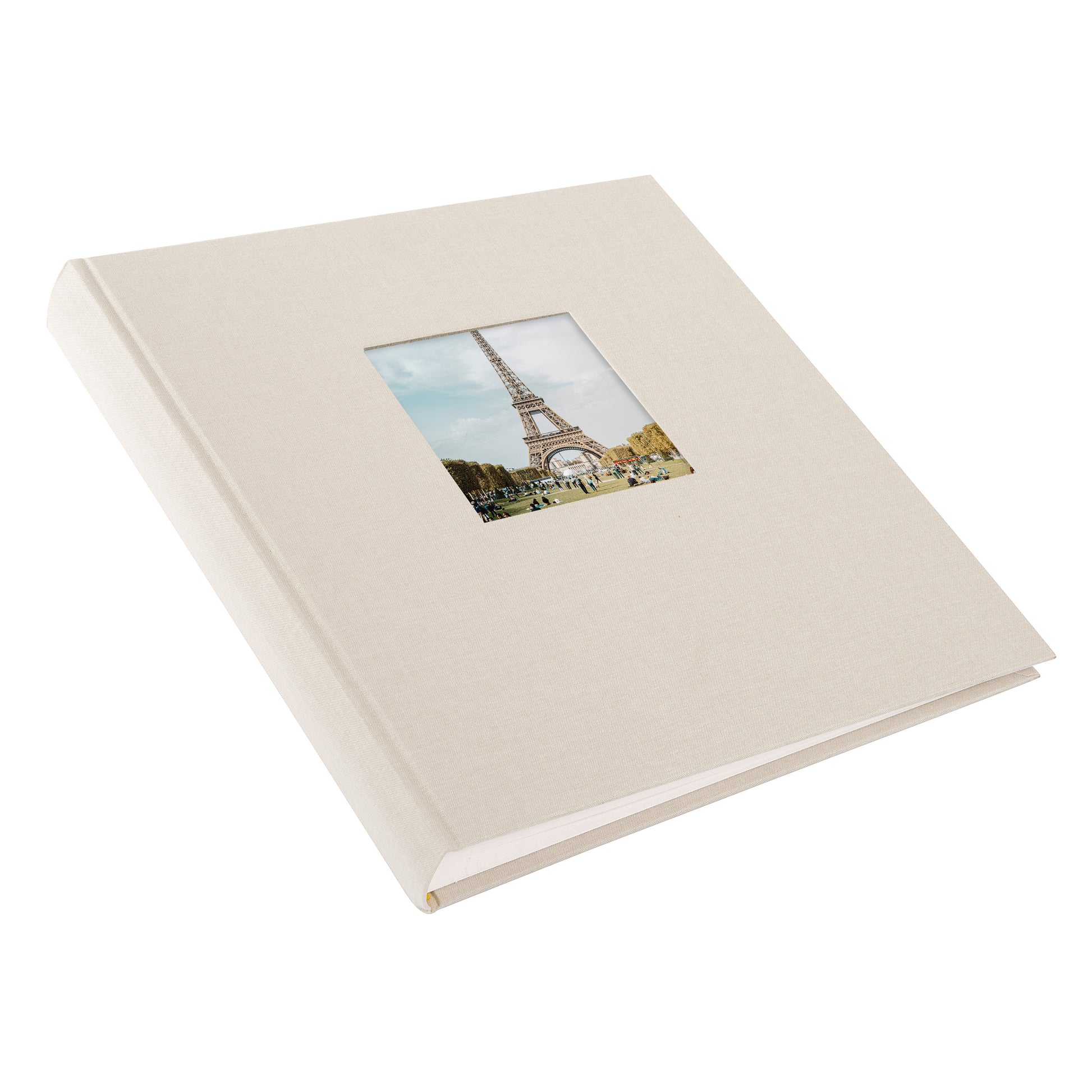 A Goldbuch sandgrey photo album with a cover illustration of the Eiffel tower, showcasing its hardcover design and white pages.